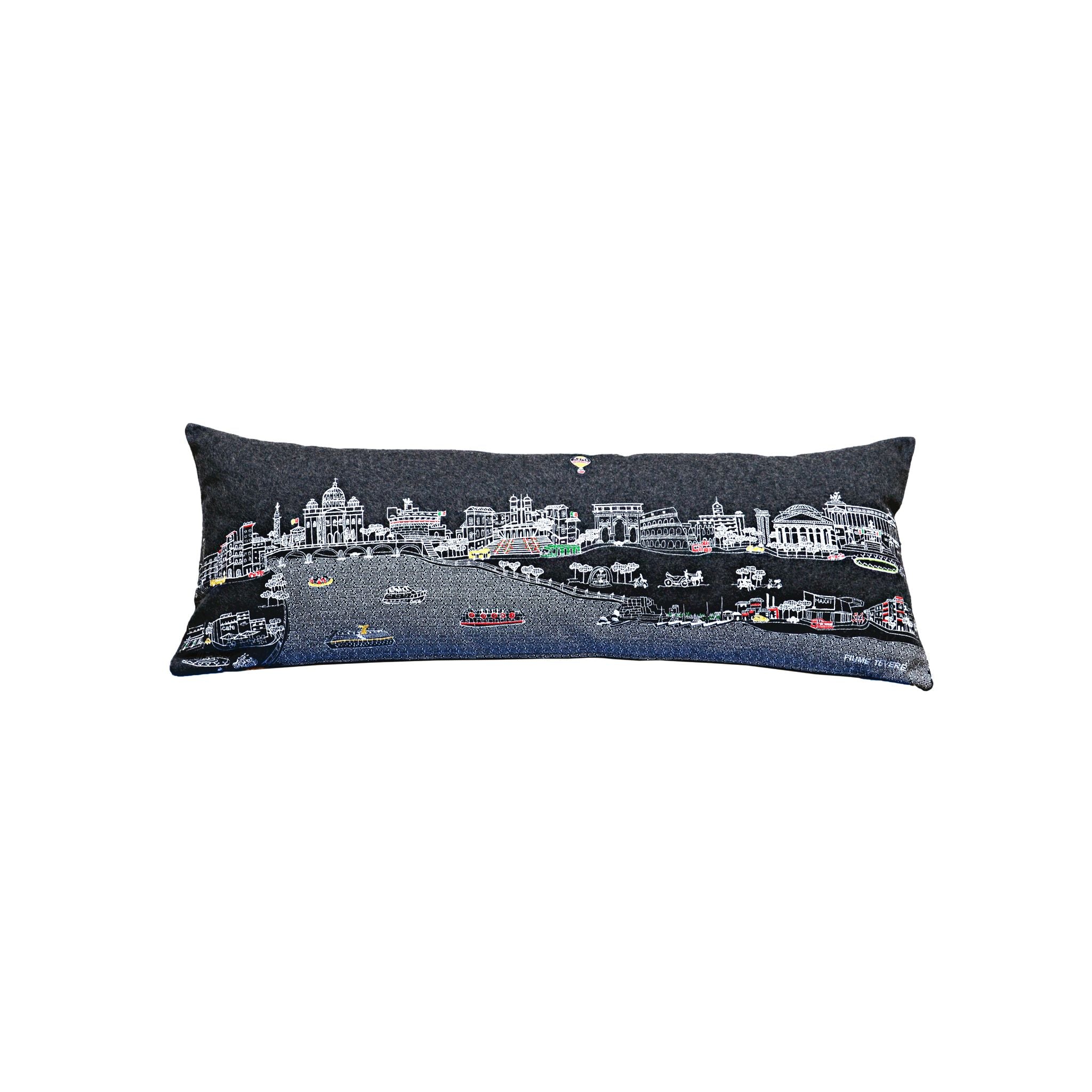 Rome Pillow featuring architectural designs inspired by Rome, Italy, with hints of gold and a red zipper.