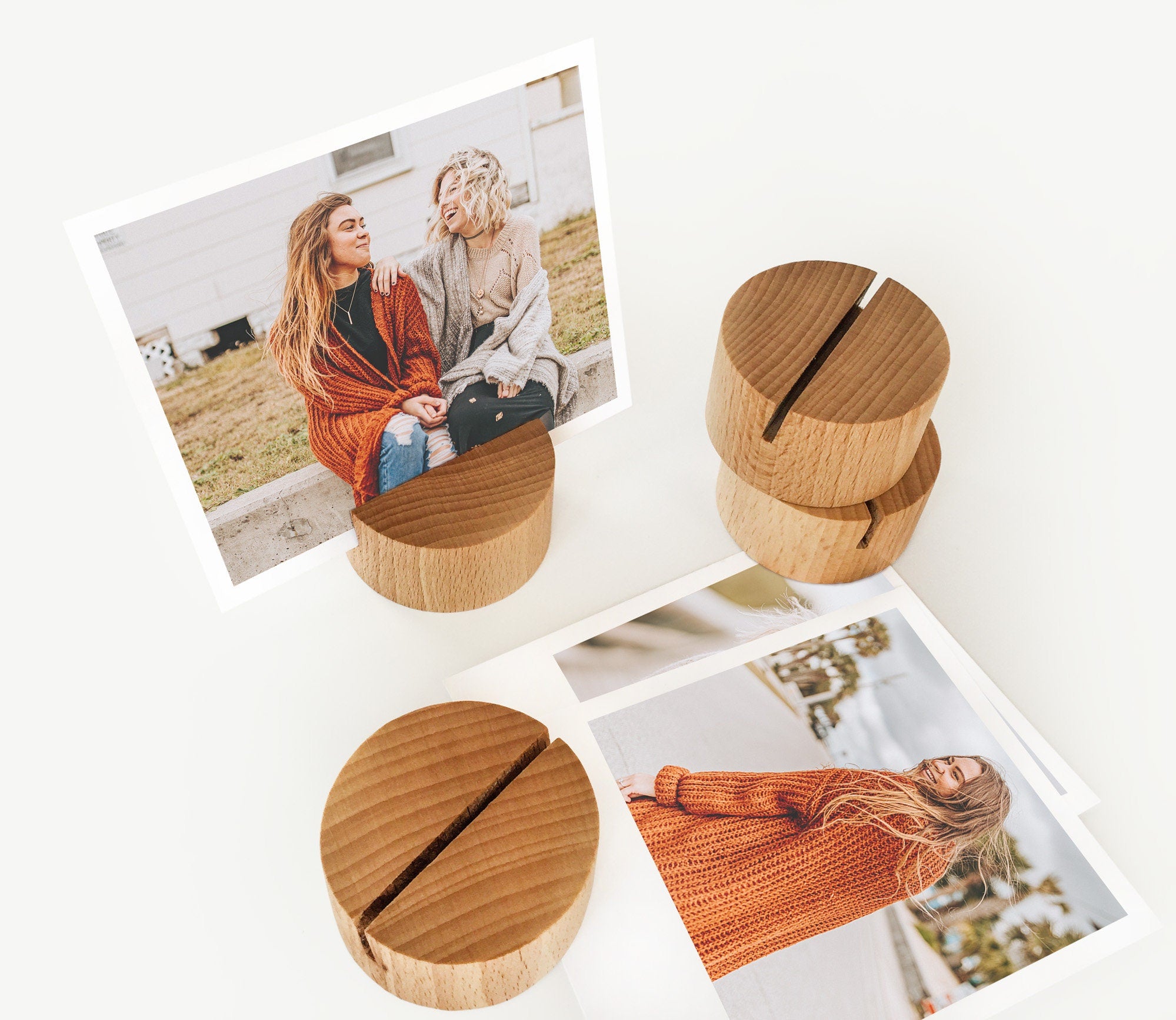 A handcrafted Round Wood Card Holder made from eco-friendly wood, displaying a small photo and showcasing its natural finish.