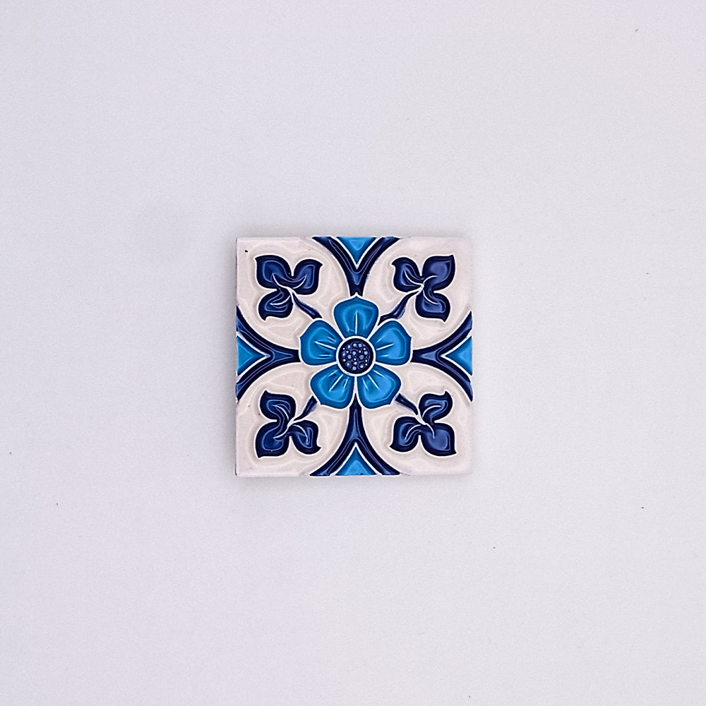 Hand-painted Royal Blue Small Ceramic Tile, showcasing intricate designs and vibrant color, perfect for home decor.