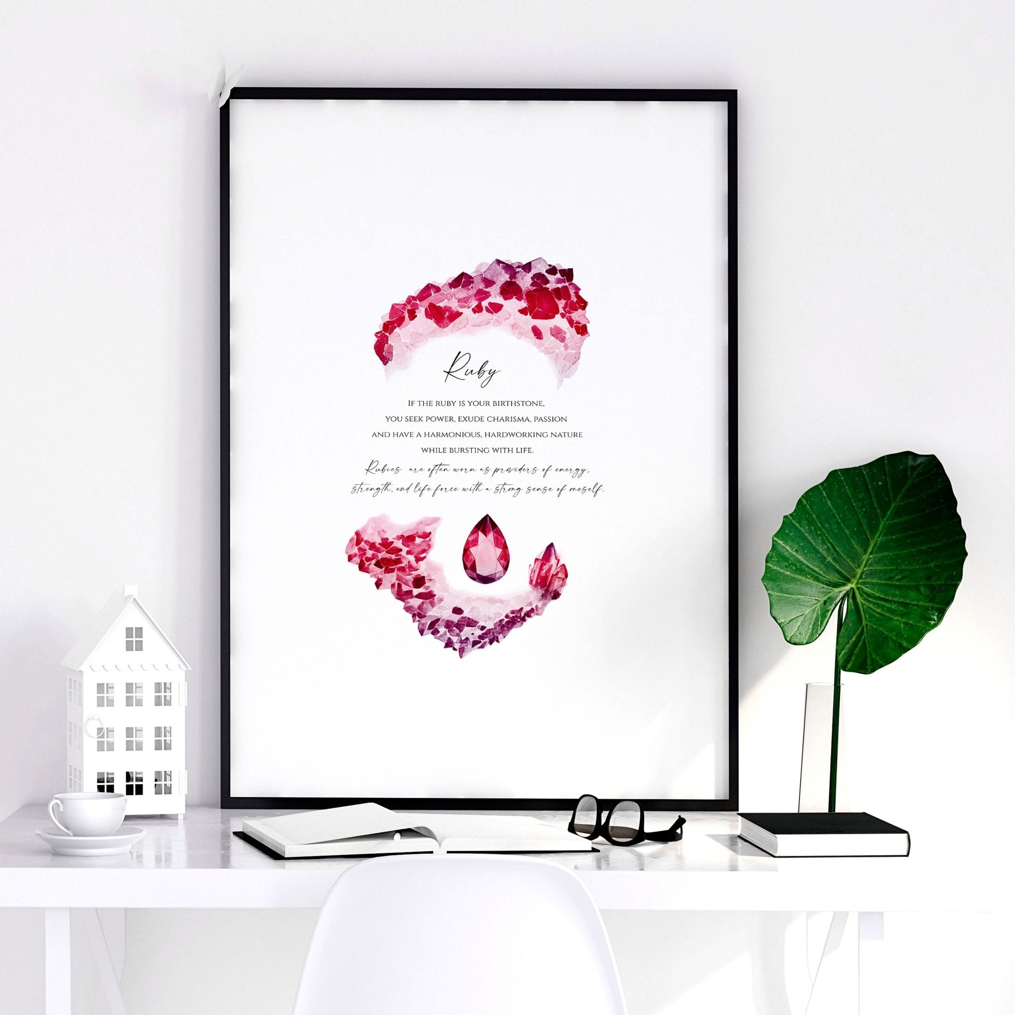 Framed wall art print featuring a vibrant ruby birthstone design, showcasing deep red hues and sparkling facets.