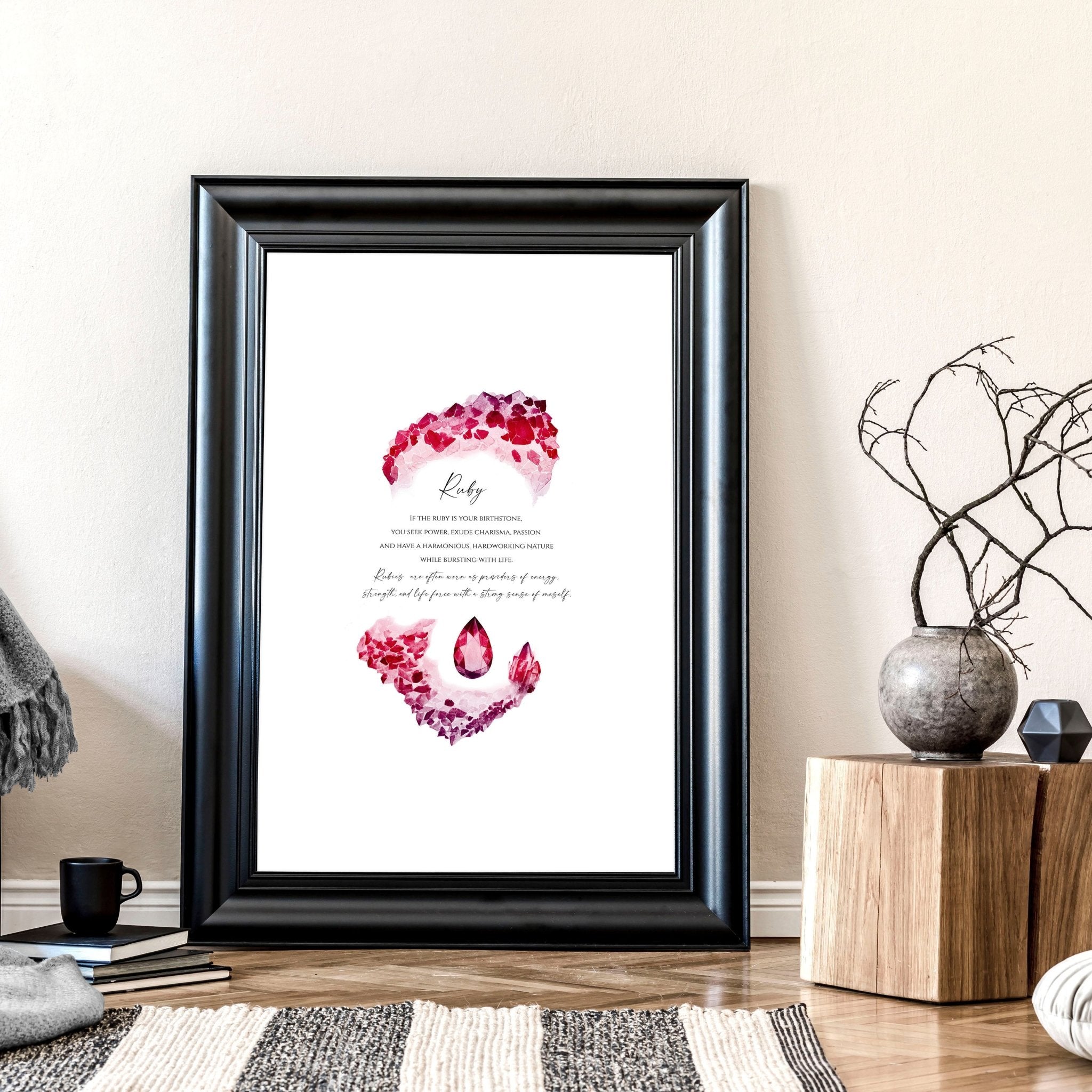 Framed wall art print featuring a vibrant ruby birthstone design, showcasing deep red hues and sparkling facets.