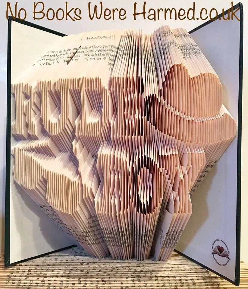 Handcrafted Rude Boy Ska Two Tone book art made from vintage books, showcasing unique folded pages in vibrant colors.