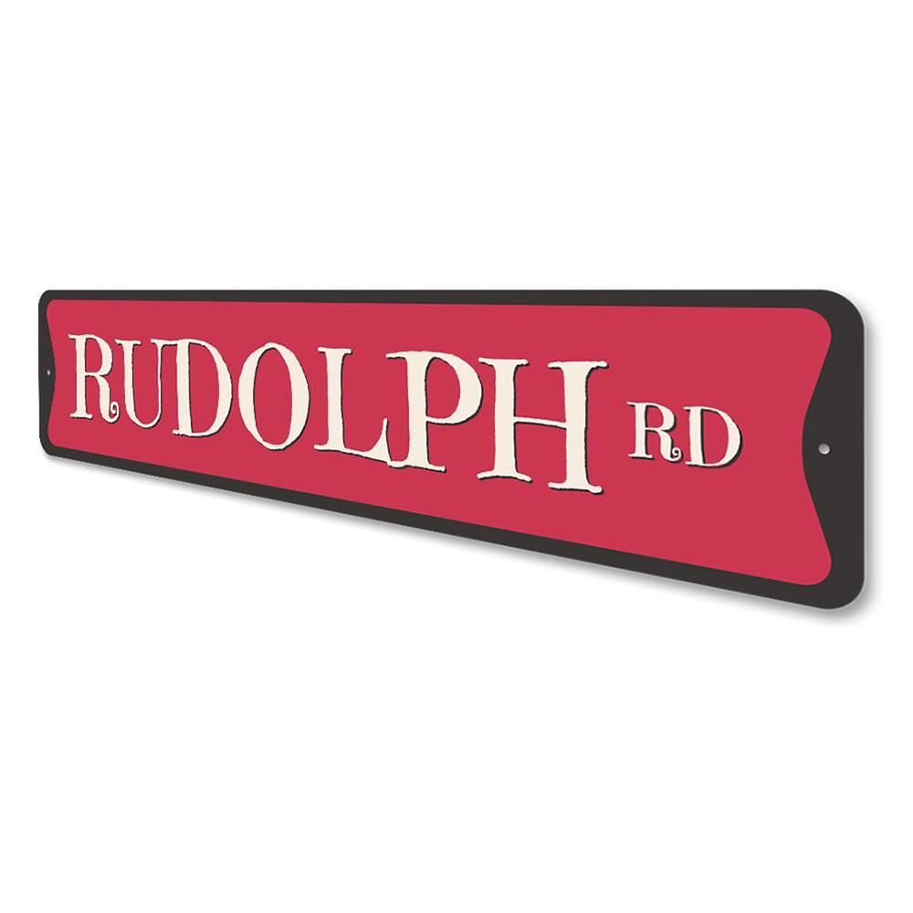 Rudolph Road Holiday Sign featuring festive Christmas design, made from high-quality aluminum, perfect for holiday decorations.