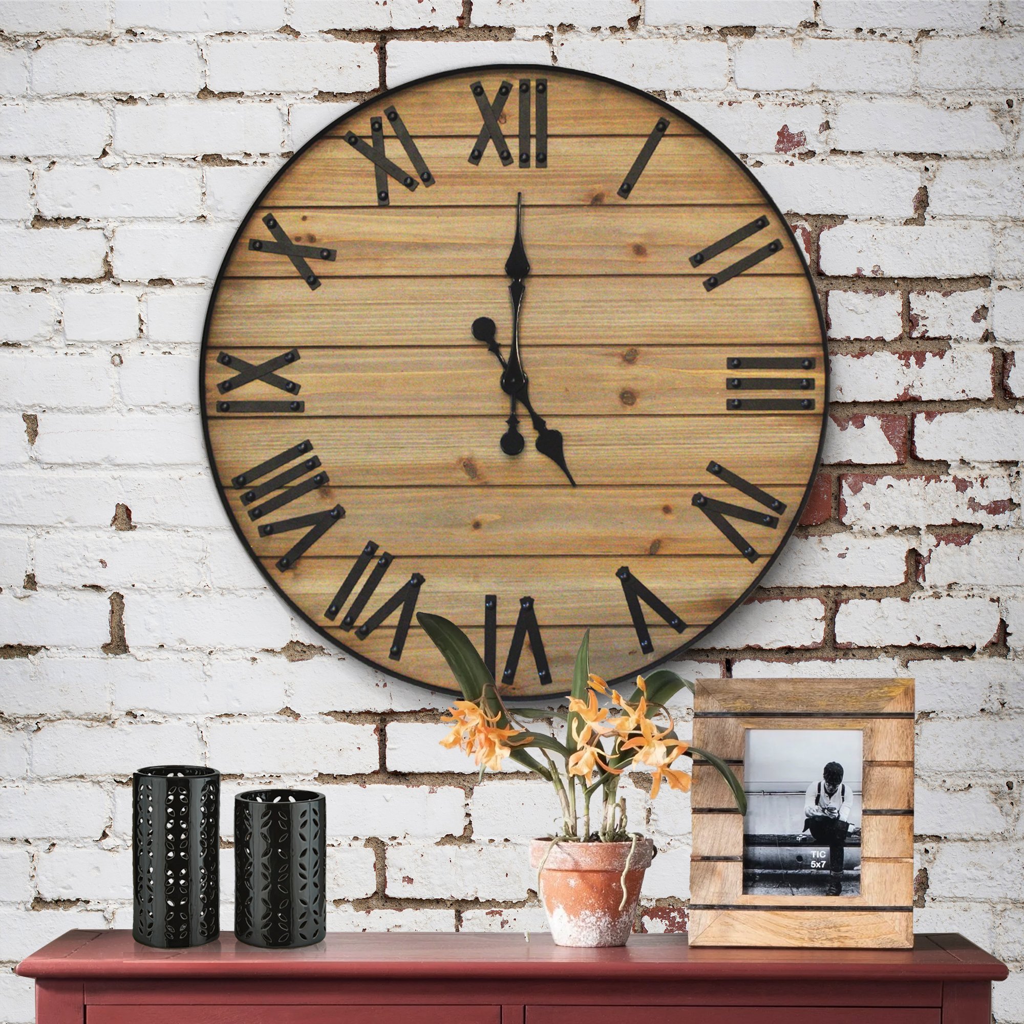 A beautifully crafted 24-inch Rustic Wall Clock made from reclaimed cedar wood, featuring cast iron numbers and hands, perfect for farmhouse decor.