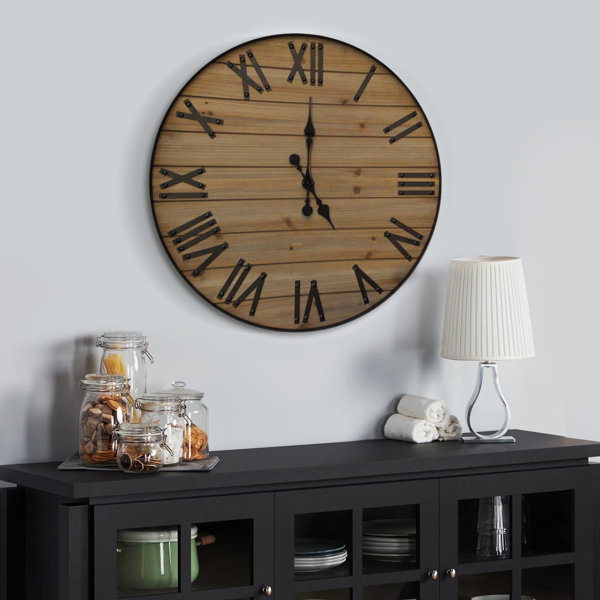 A beautifully crafted 24-inch Rustic Wall Clock made from reclaimed cedar wood, featuring cast iron numbers and hands, perfect for farmhouse decor.