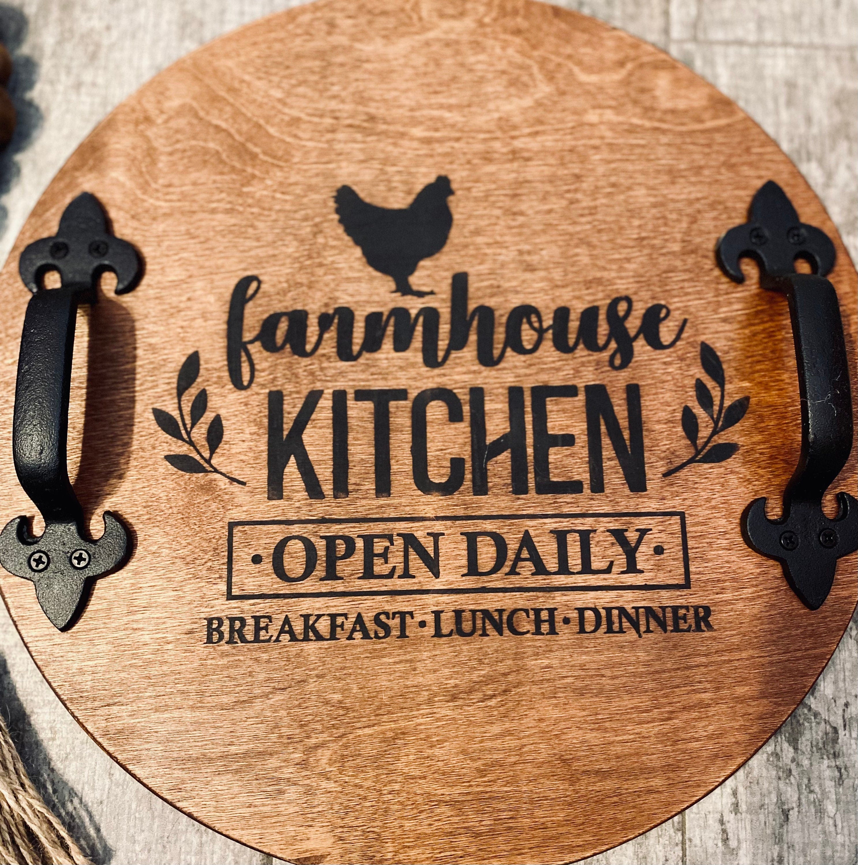 Rustic round wood tray with handles, featuring a charming rooster design, stained in English Chestnut color.