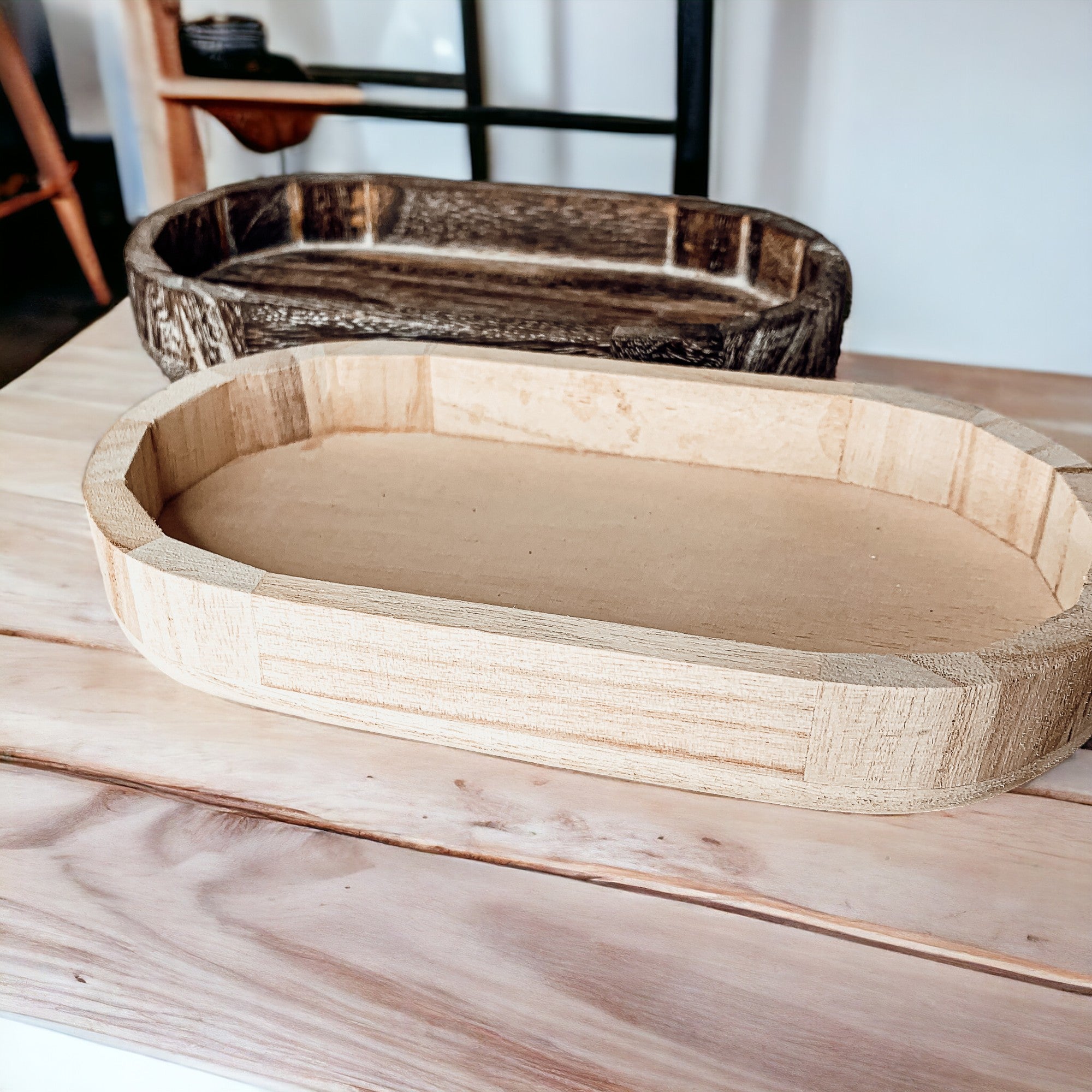 A rustic wood tray made from Paulownia wood, featuring white distressed details, ideal for home decor and organization.