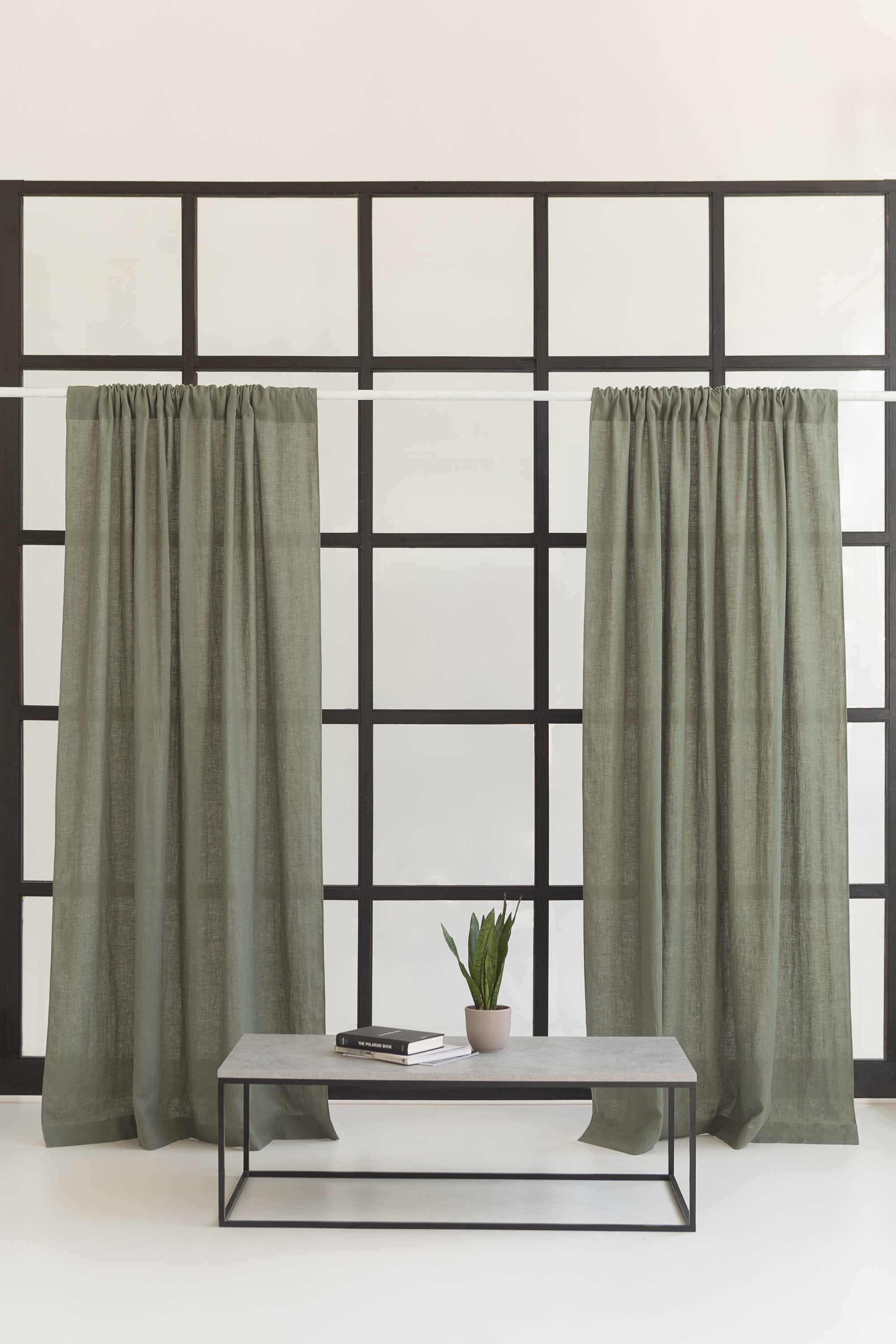 Safari Green linen curtain with rod pocket, showcasing its semi-sheer texture and elegant design.