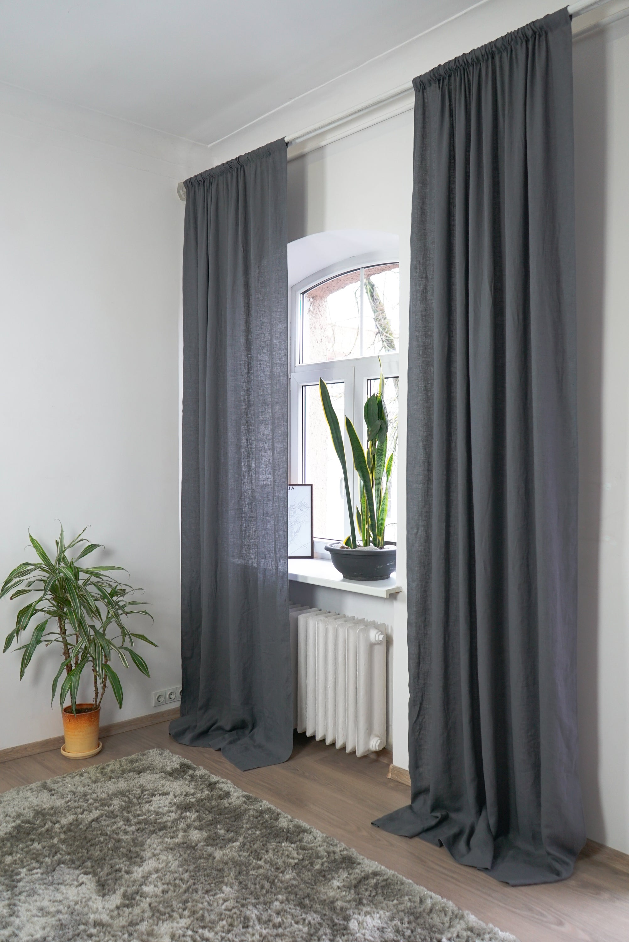 Safari Green linen curtain with rod pocket, showcasing its semi-sheer texture and elegant design.