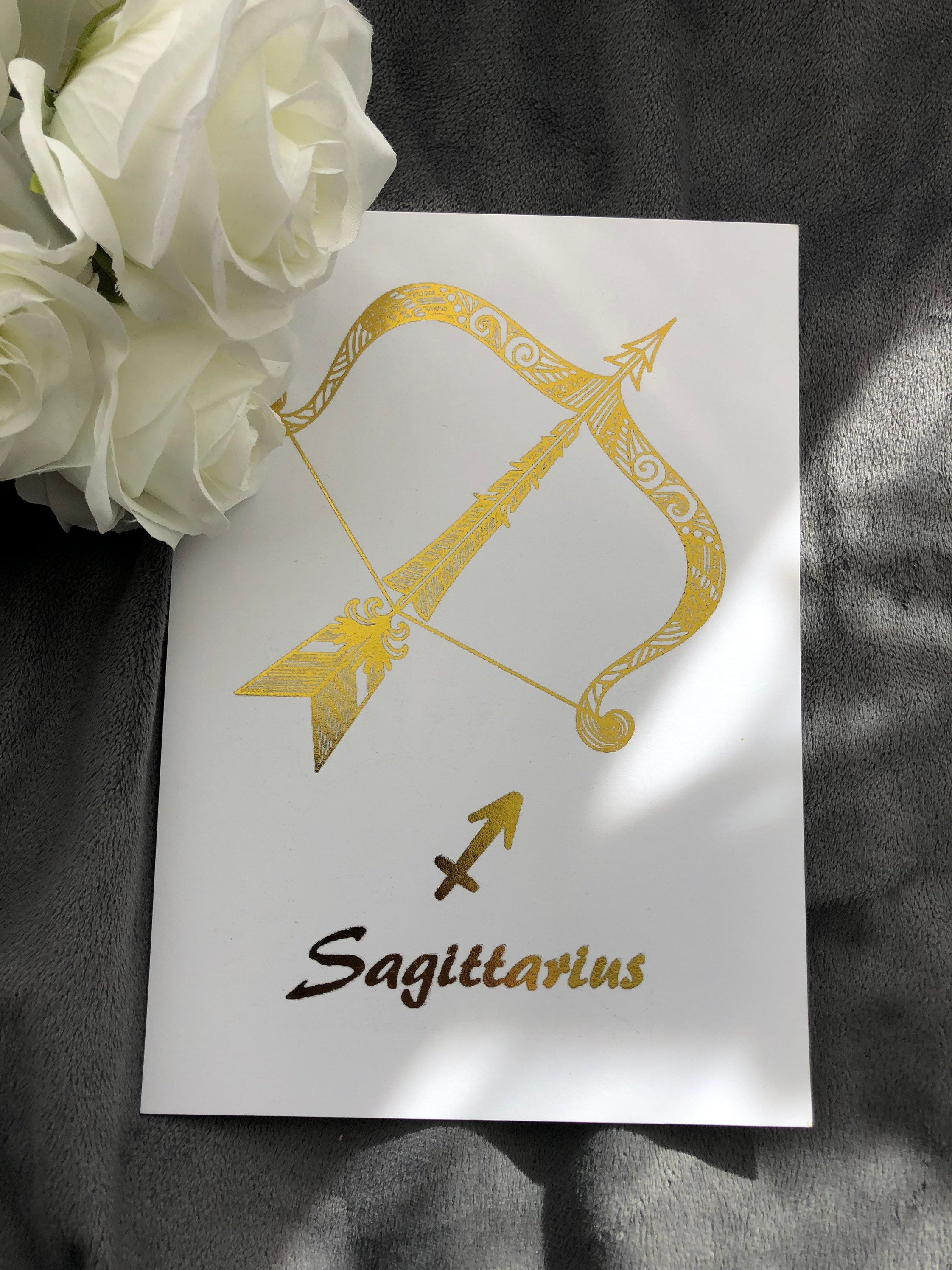 Sagittarius Star Sign Foil Print featuring an elegant archer design with shimmering foil accents.