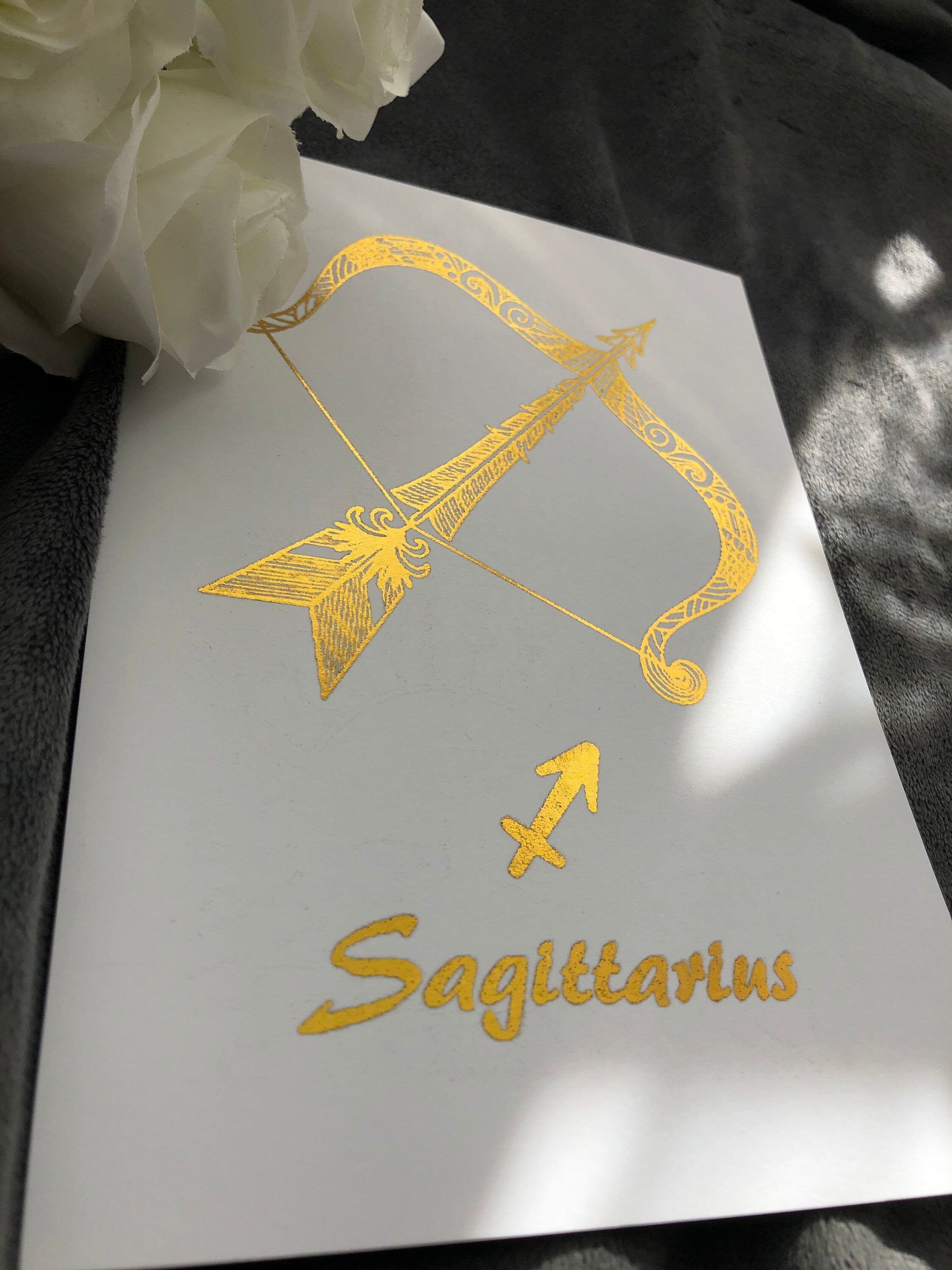 Sagittarius Star Sign Foil Print featuring an elegant archer design with shimmering foil accents.