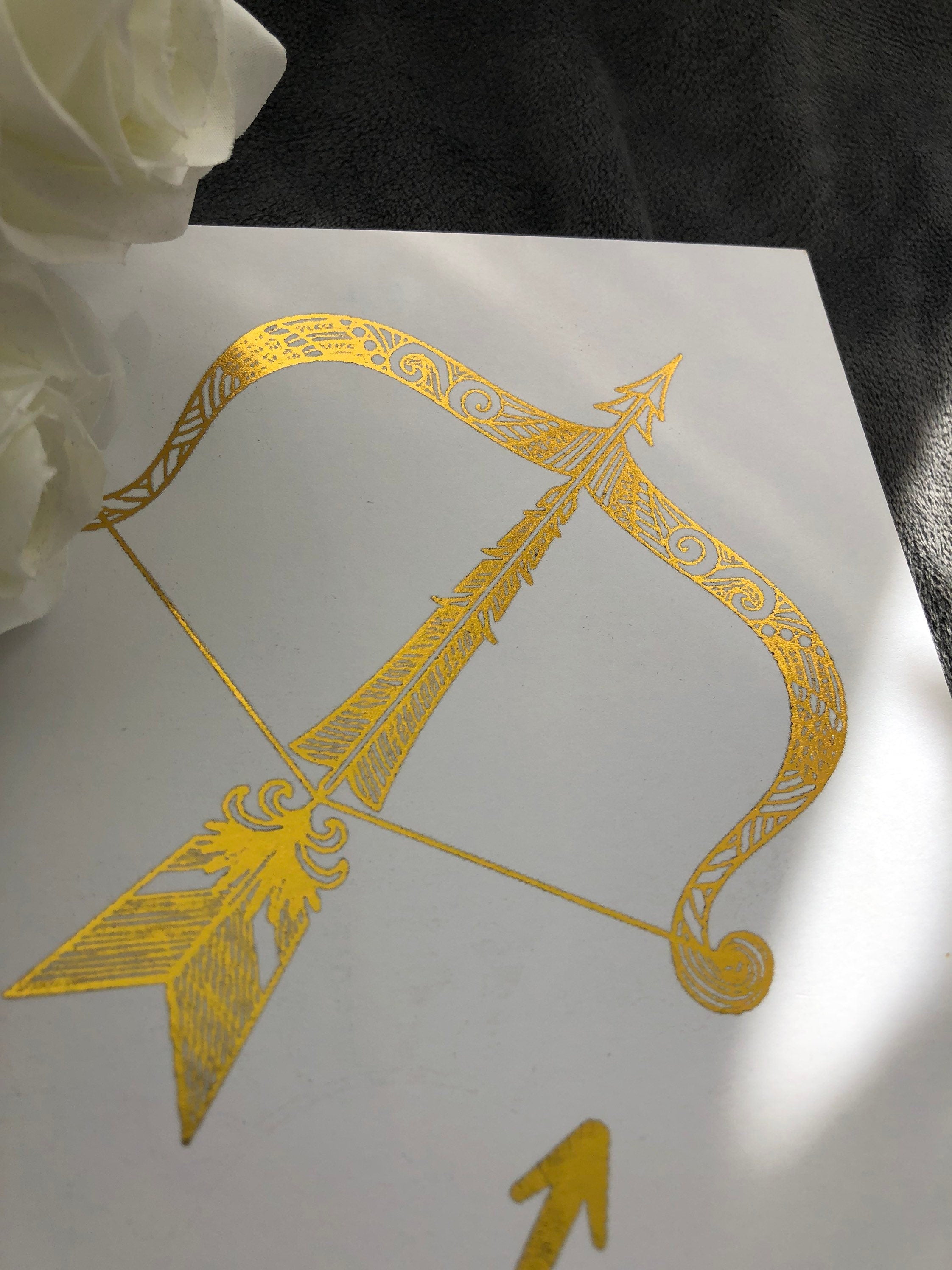 Sagittarius Star Sign Foil Print featuring an elegant archer design with shimmering foil accents.