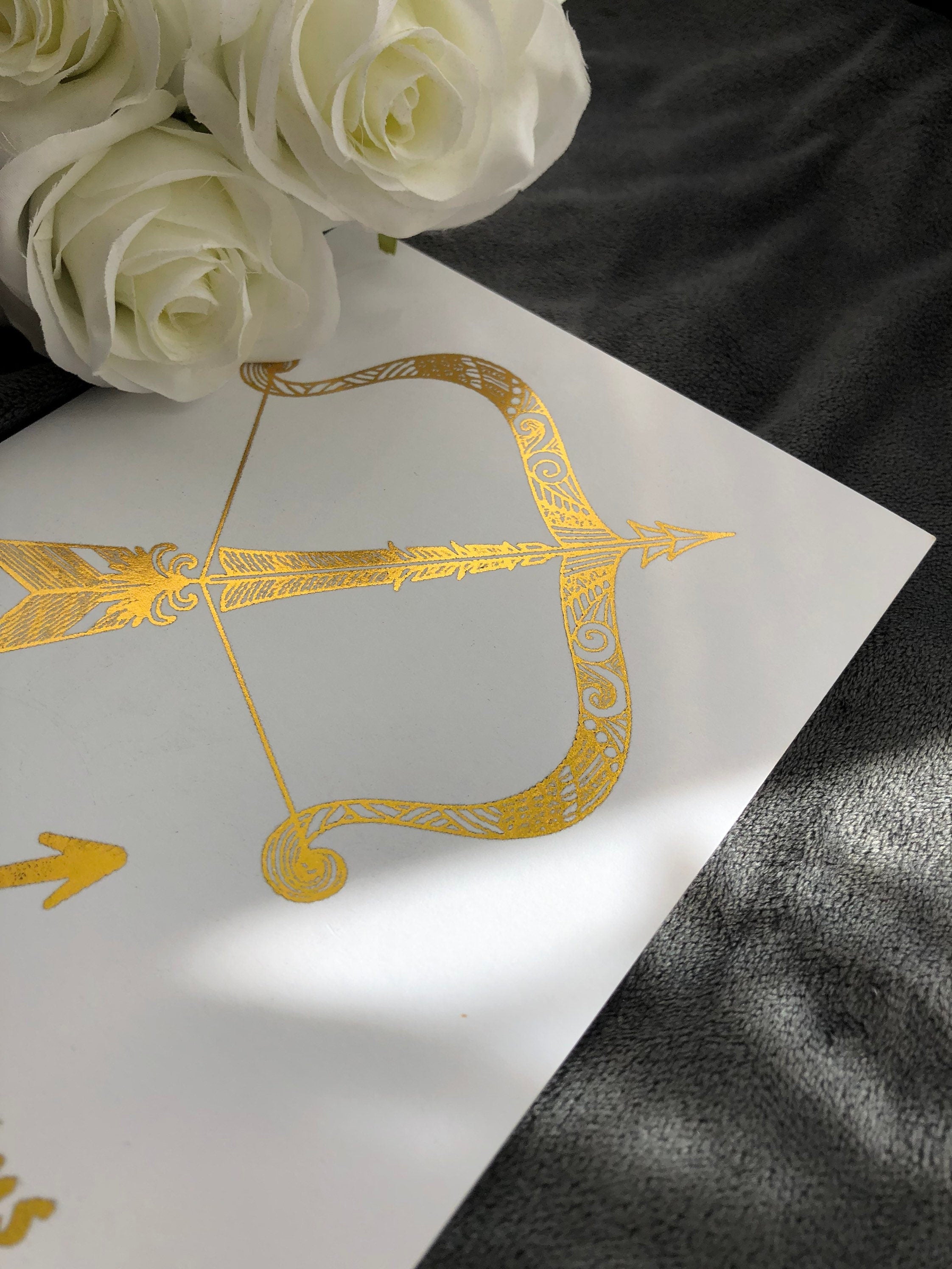 Sagittarius Star Sign Foil Print featuring an elegant archer design with shimmering foil accents.