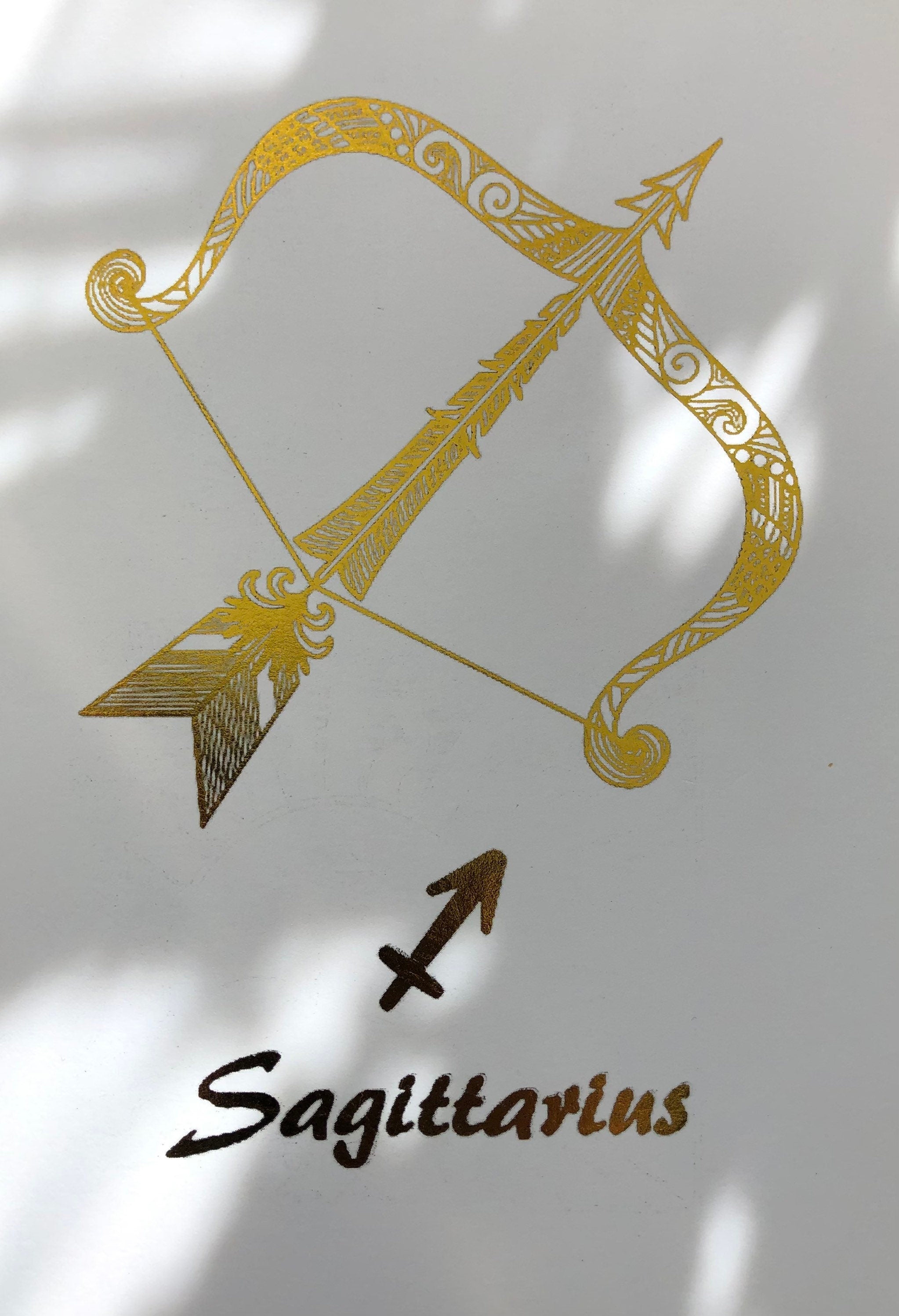 Sagittarius Star Sign Foil Print featuring an elegant archer design with shimmering foil accents.