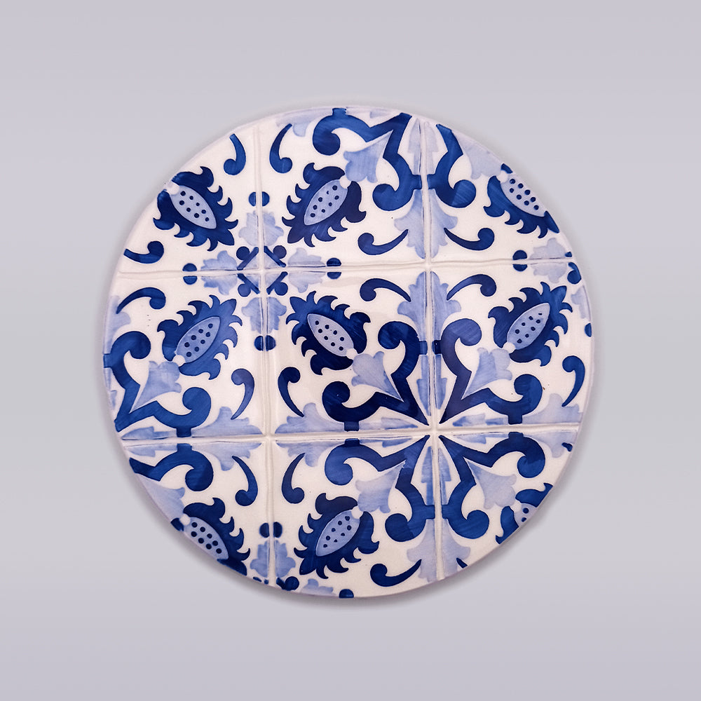 Hand-crafted Sagres Ceramic Pad for Hot Pans featuring unique hand-painted designs, ideal for protecting surfaces from heat.