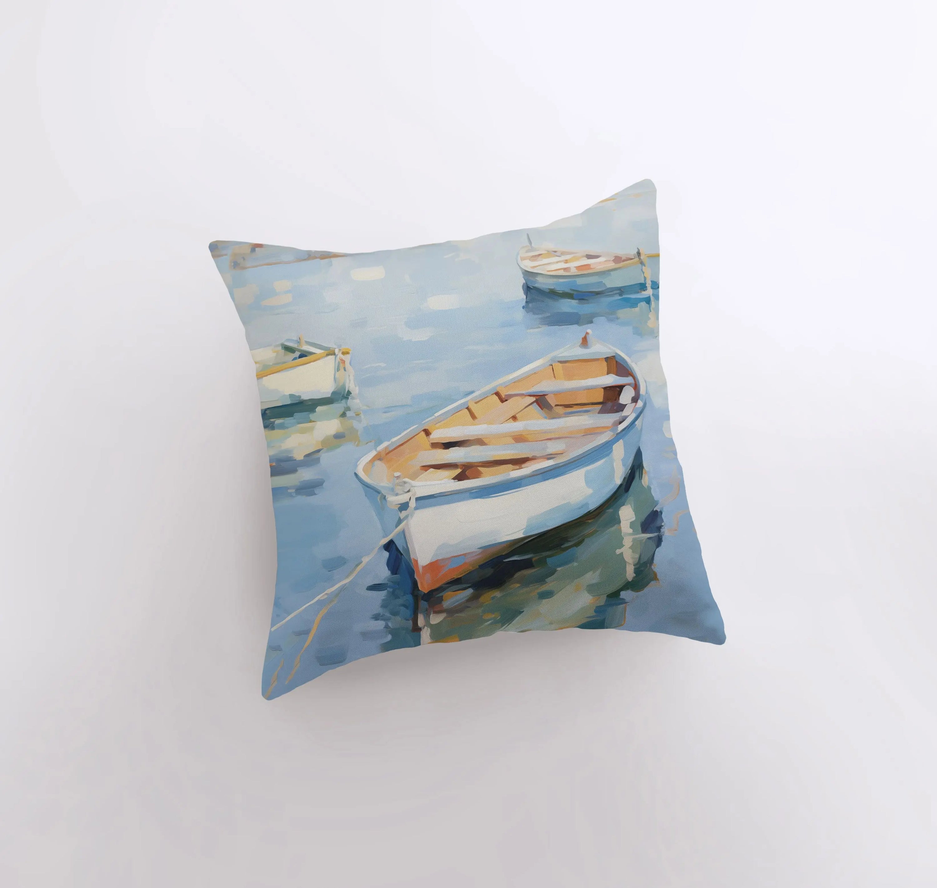 A beautifully crafted throw pillow featuring a sailboat on blue water, perfect for coastal decor.