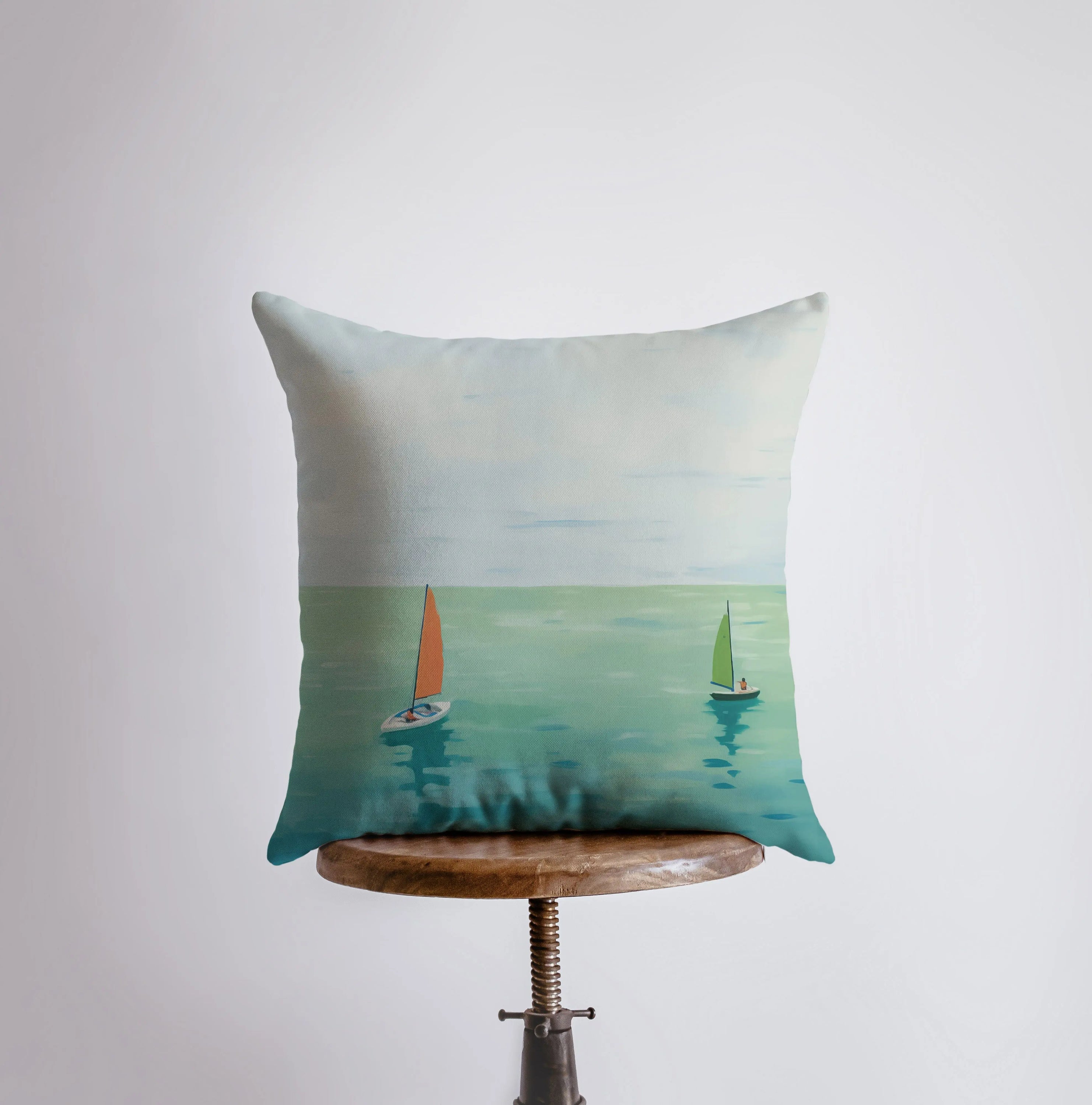 Sailboats on Blue Sea throw pillow featuring a vibrant gouache painting on a cotton/polyester blend fabric with a concealed zipper.