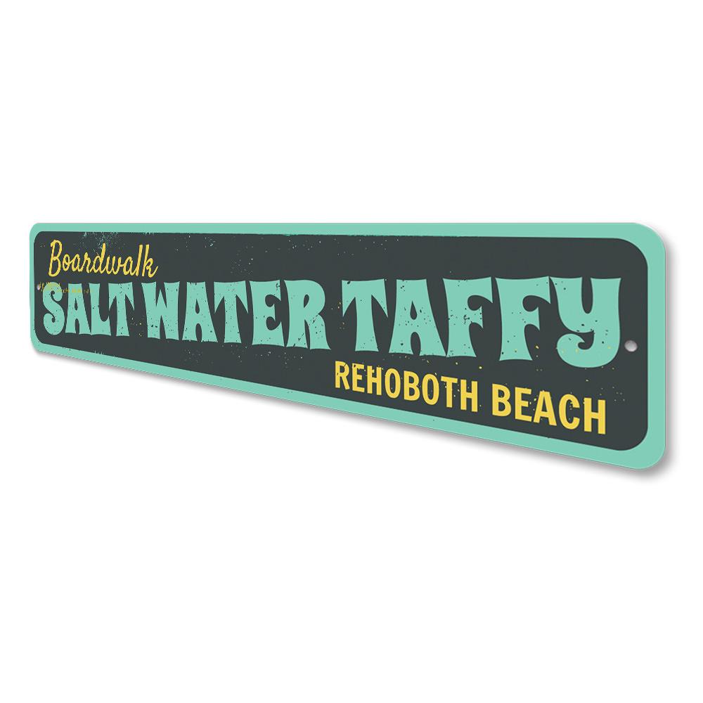 A colorful Saltwater Taffy Sign made of durable aluminum, featuring beach-themed graphics and customizable text options.