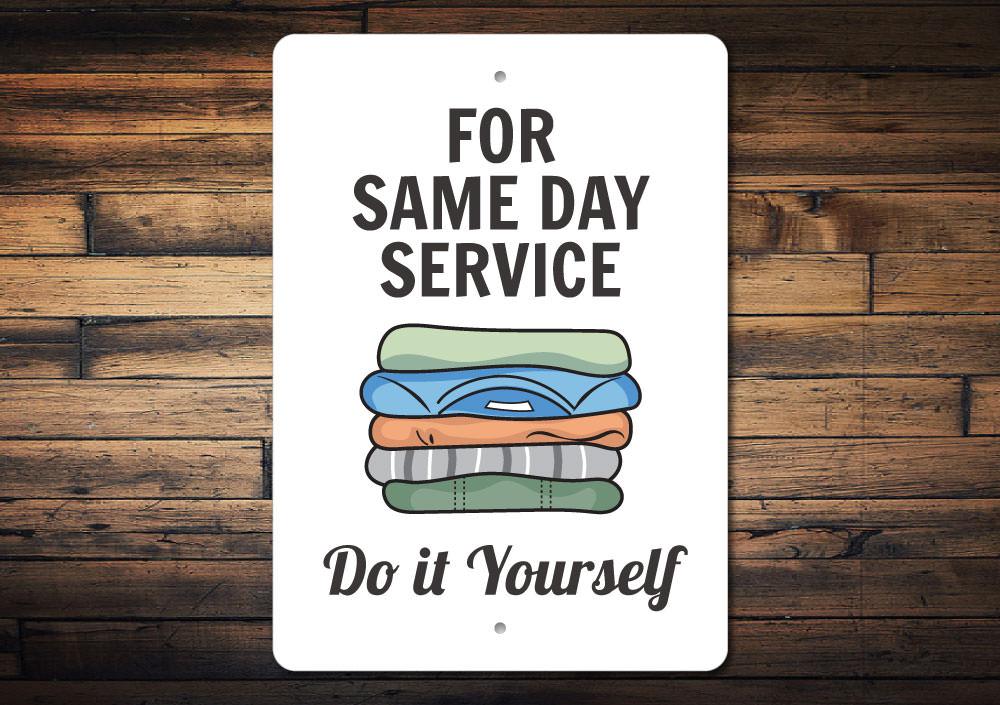 Same Day Service Laundry Sign made of durable aluminum, featuring customizable text and pre-drilled holes for easy mounting.