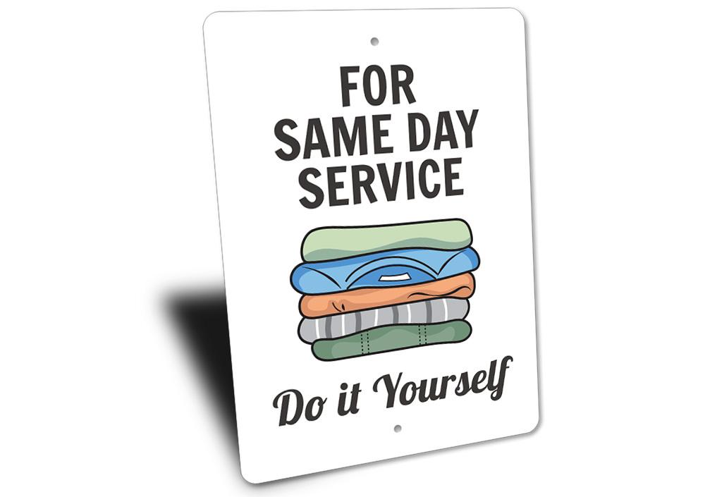 Same Day Service Laundry Sign made of durable aluminum, featuring customizable text and pre-drilled holes for easy mounting.