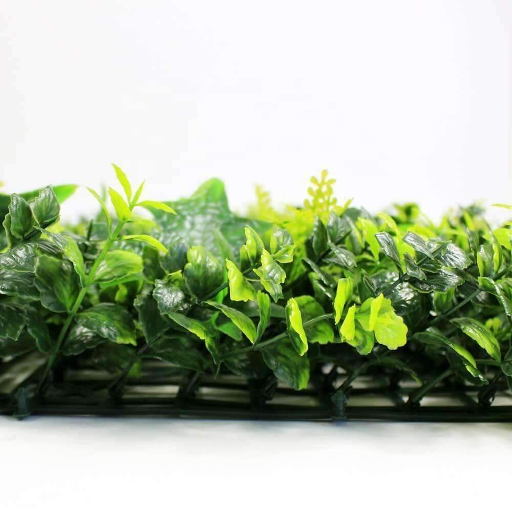 A 25cm x 25cm Jasmine Leaf Artificial Hedge Panel showcasing realistic green leaves and vibrant colors, ideal for vertical gardens.