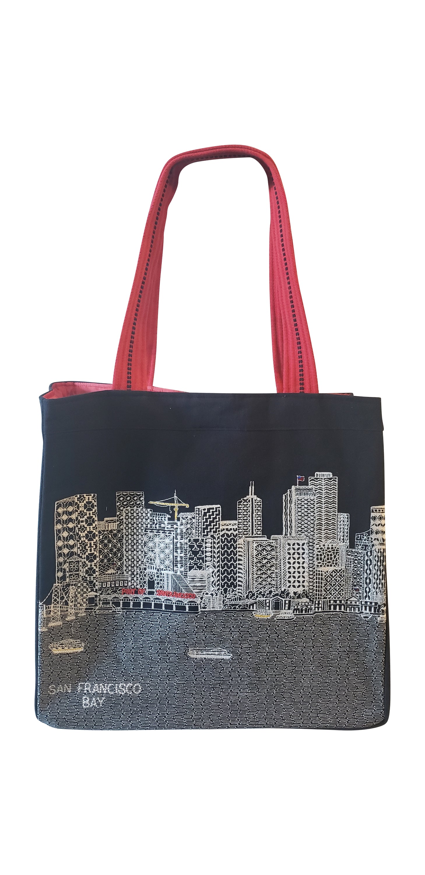 San Francisco Tote Bag featuring an embroidered skyline on cream and black cotton canvas with red waterproof lining and ribbed straps.