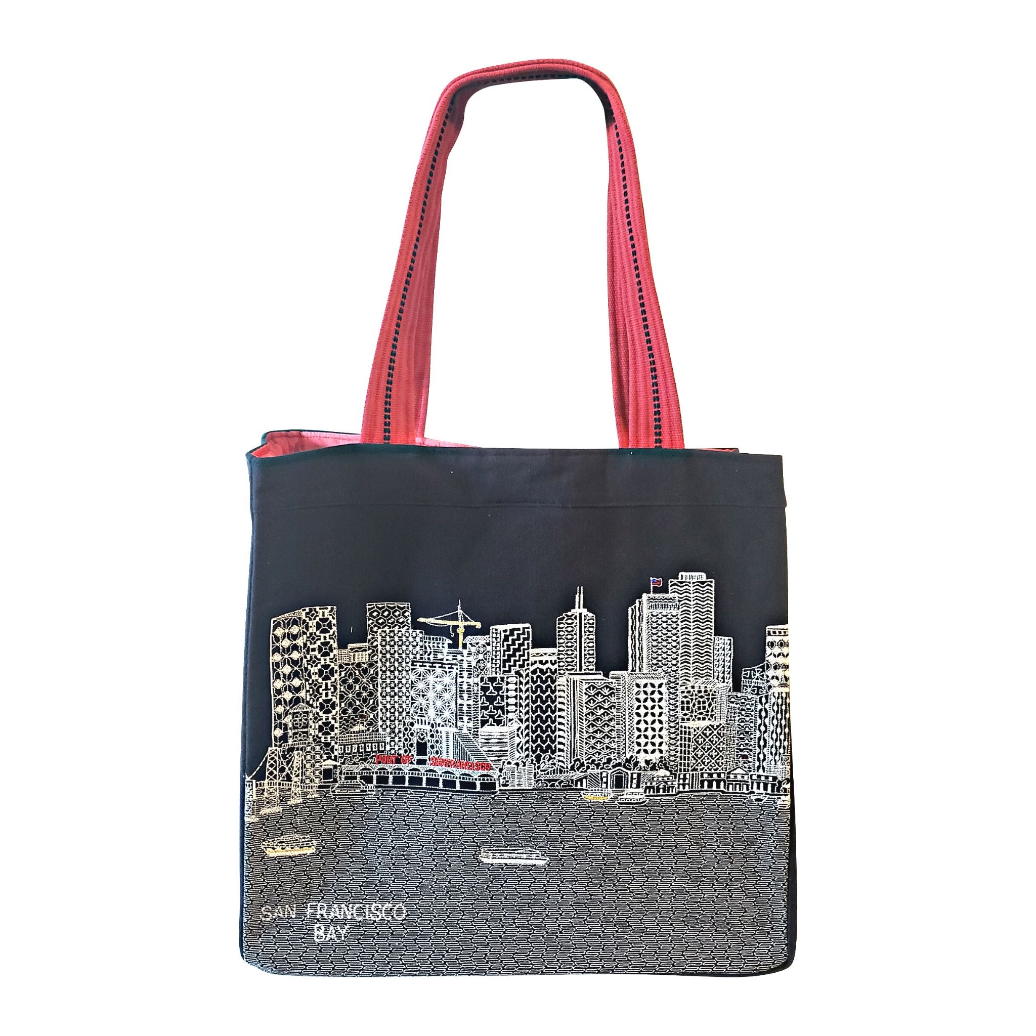 San Francisco Tote Bag featuring an embroidered skyline on cream and black cotton canvas with red waterproof lining and ribbed straps.