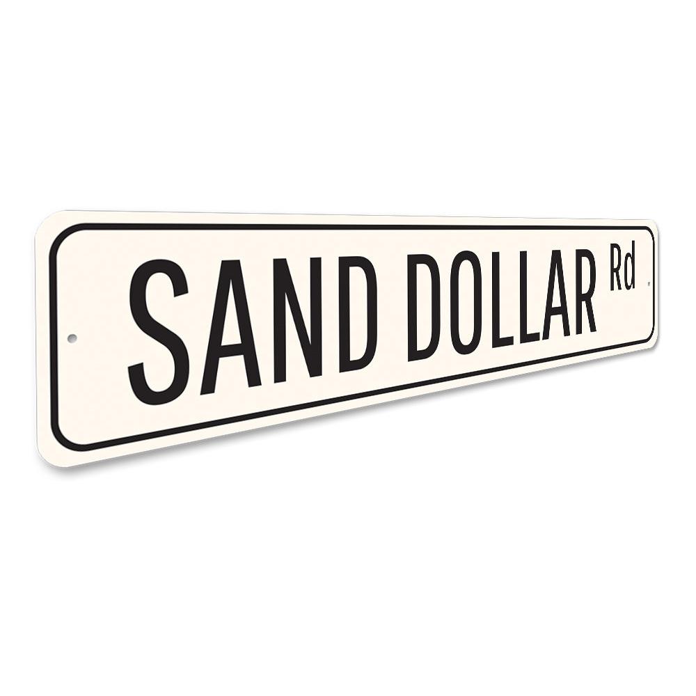 A decorative Sand Dollar Road Sign made of high-quality aluminum, featuring a coastal design perfect for home decor.