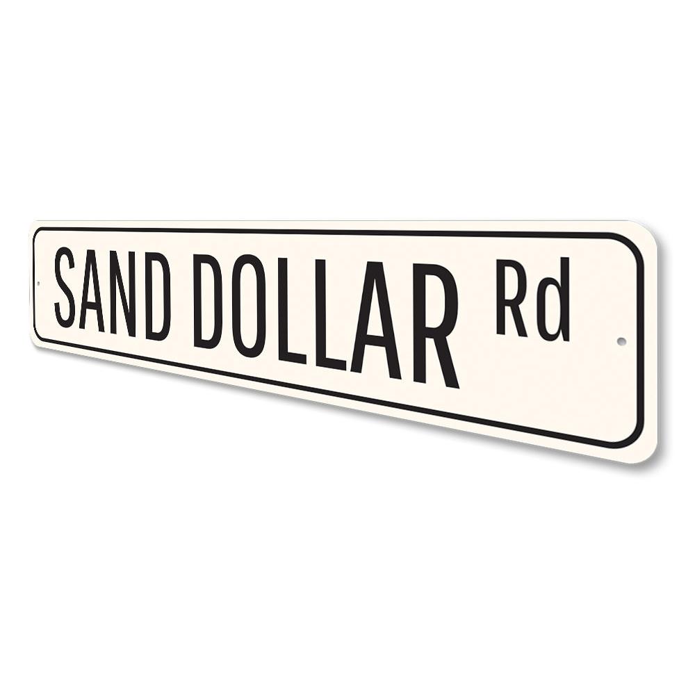 A decorative Sand Dollar Road Sign made of high-quality aluminum, featuring a coastal design perfect for home decor.