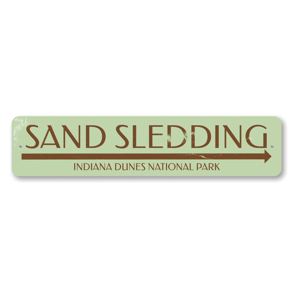 Custom Sand Sledding Sign made of aluminum, featuring vibrant colors and personalized text options, perfect for indoor or outdoor display.