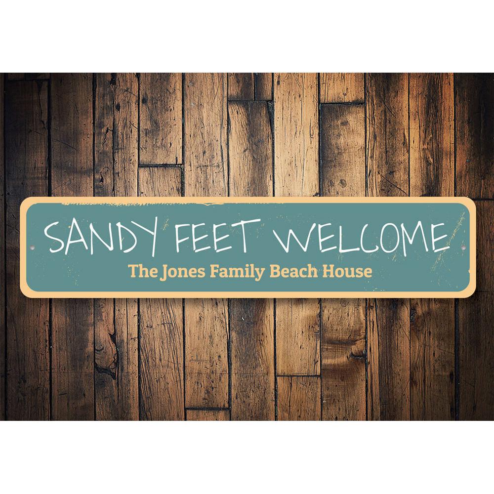 Sandy Feet Welcome Sign made of aluminum, featuring beach-themed design, perfect for coastal decor.