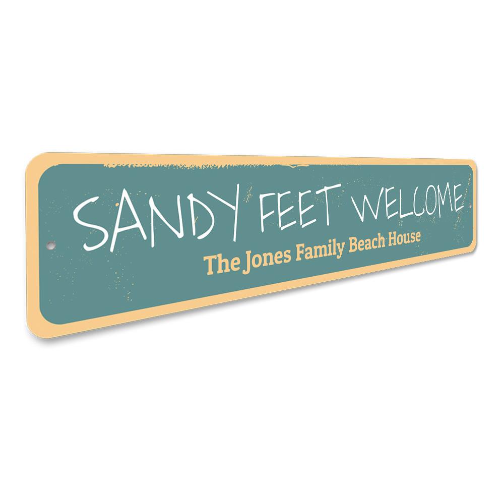 Sandy Feet Welcome Sign made of aluminum, featuring beach-themed design, perfect for coastal decor.