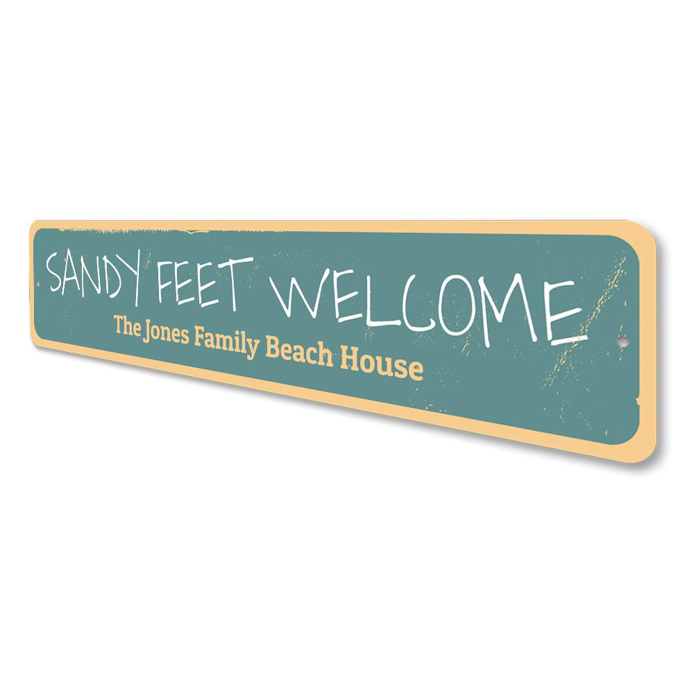 Sandy Feet Welcome Sign made of aluminum, featuring beach-themed design, perfect for coastal decor.