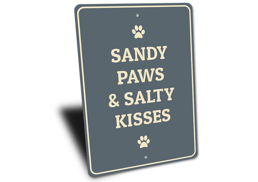 Sandy Paws decorative sign made of aluminum, featuring a playful design perfect for pet lovers, suitable for indoor and outdoor display.