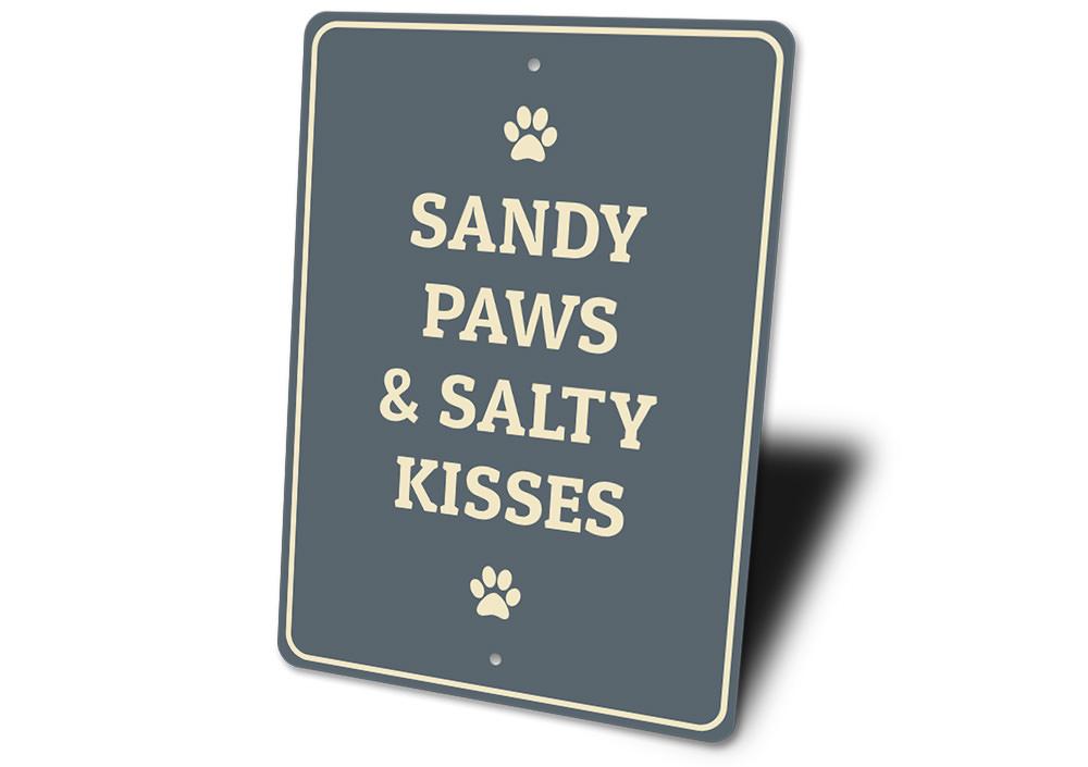 Sandy Paws decorative sign made of aluminum, featuring a playful design perfect for pet lovers, suitable for indoor and outdoor display.