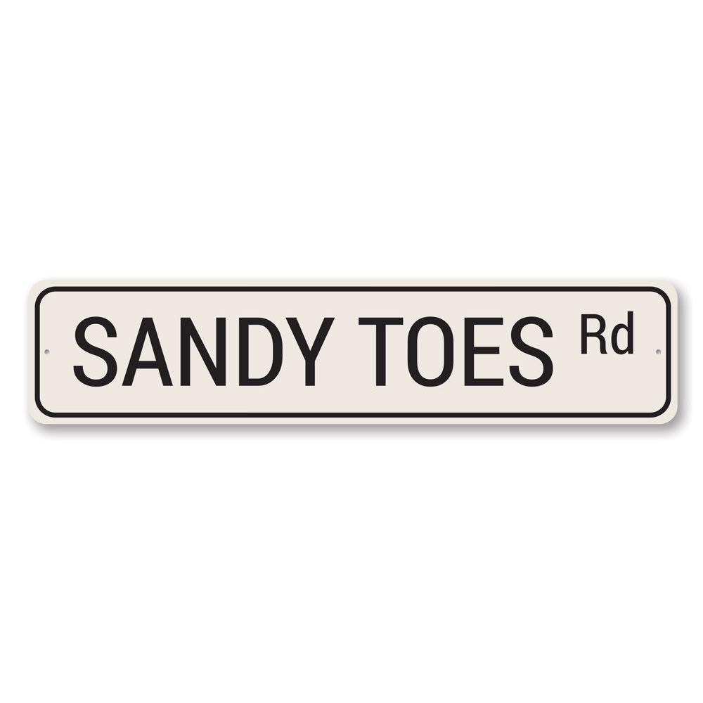 Sandy Toes Road Sign made of high-quality aluminum, featuring vibrant colors and a beach-themed design, perfect for coastal decor.