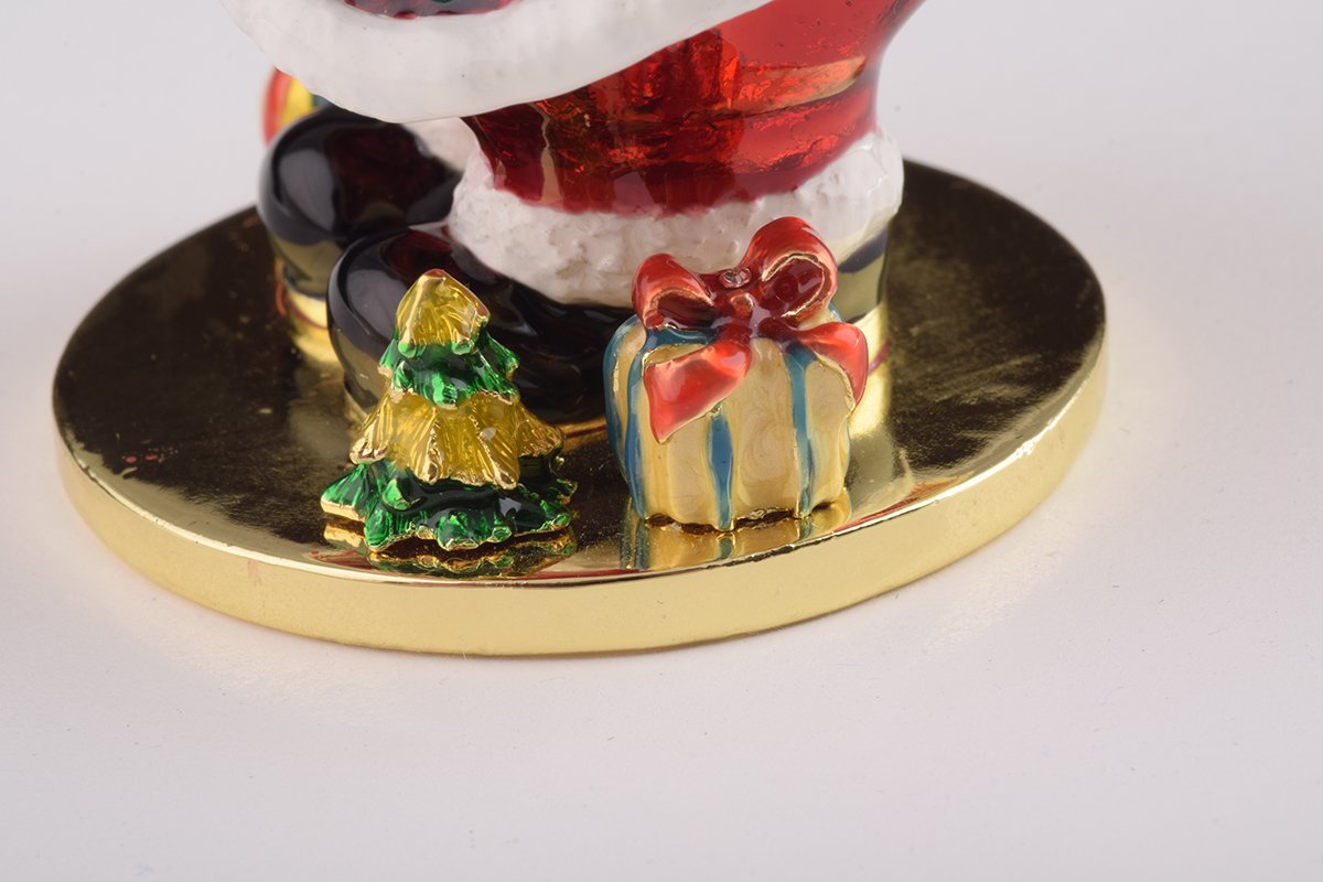 Handcrafted Santa Claus trinket box with Austrian crystals and 24K gold plating, featuring a secure magnetic closure.