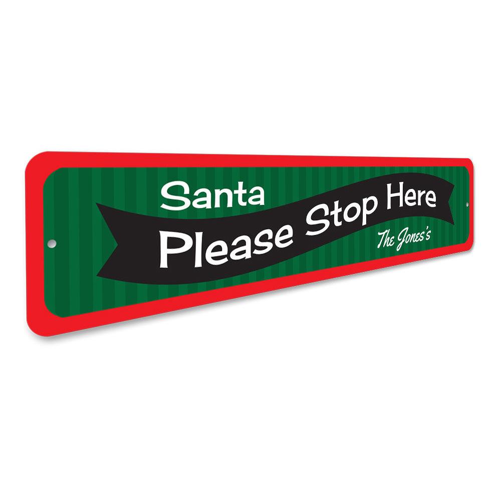 A festive Santa Please Stop Here banner sign made of high-quality aluminum, featuring vibrant colors and a charming design, perfect for holiday decorations.