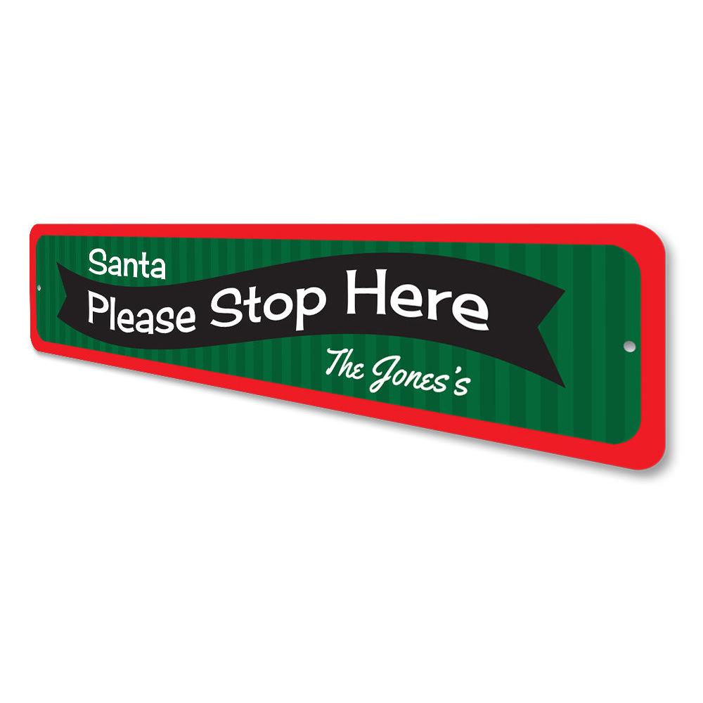 A festive Santa Please Stop Here banner sign made of high-quality aluminum, featuring vibrant colors and a charming design, perfect for holiday decorations.