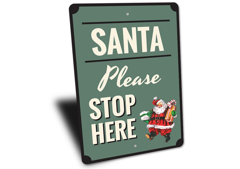 A festive Santa Please Stop Here Sign made of high-quality aluminum, featuring vibrant colors and a charming design perfect for holiday decorations.