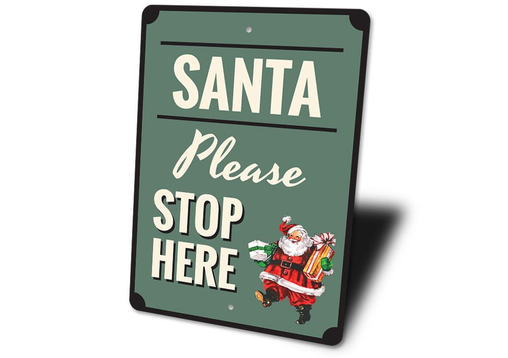 A festive Santa Please Stop Here Sign made of high-quality aluminum, featuring vibrant colors and a charming design perfect for holiday decorations.