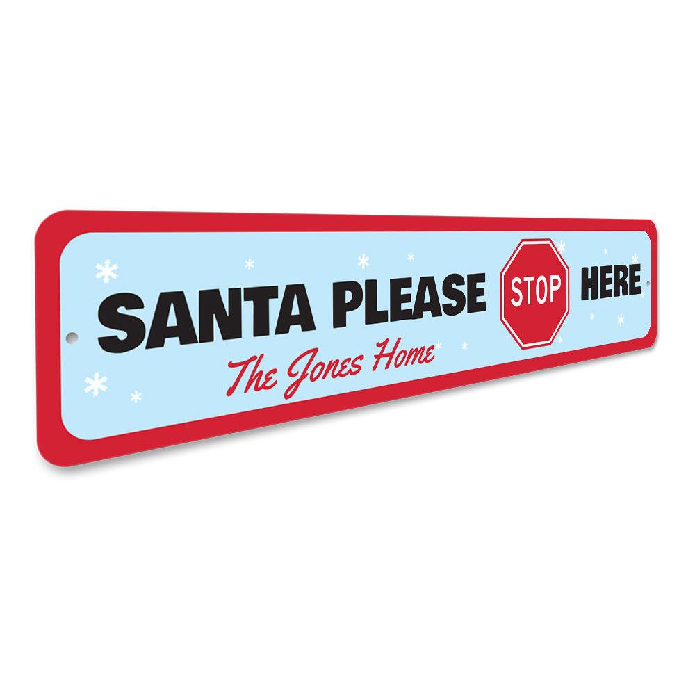 A festive Santa Please Stop Here Sign made of high-quality aluminum, featuring a charming design perfect for Christmas decorations.