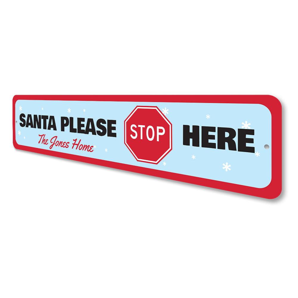 A festive Santa Please Stop Here Sign made of high-quality aluminum, featuring a charming design perfect for Christmas decorations.