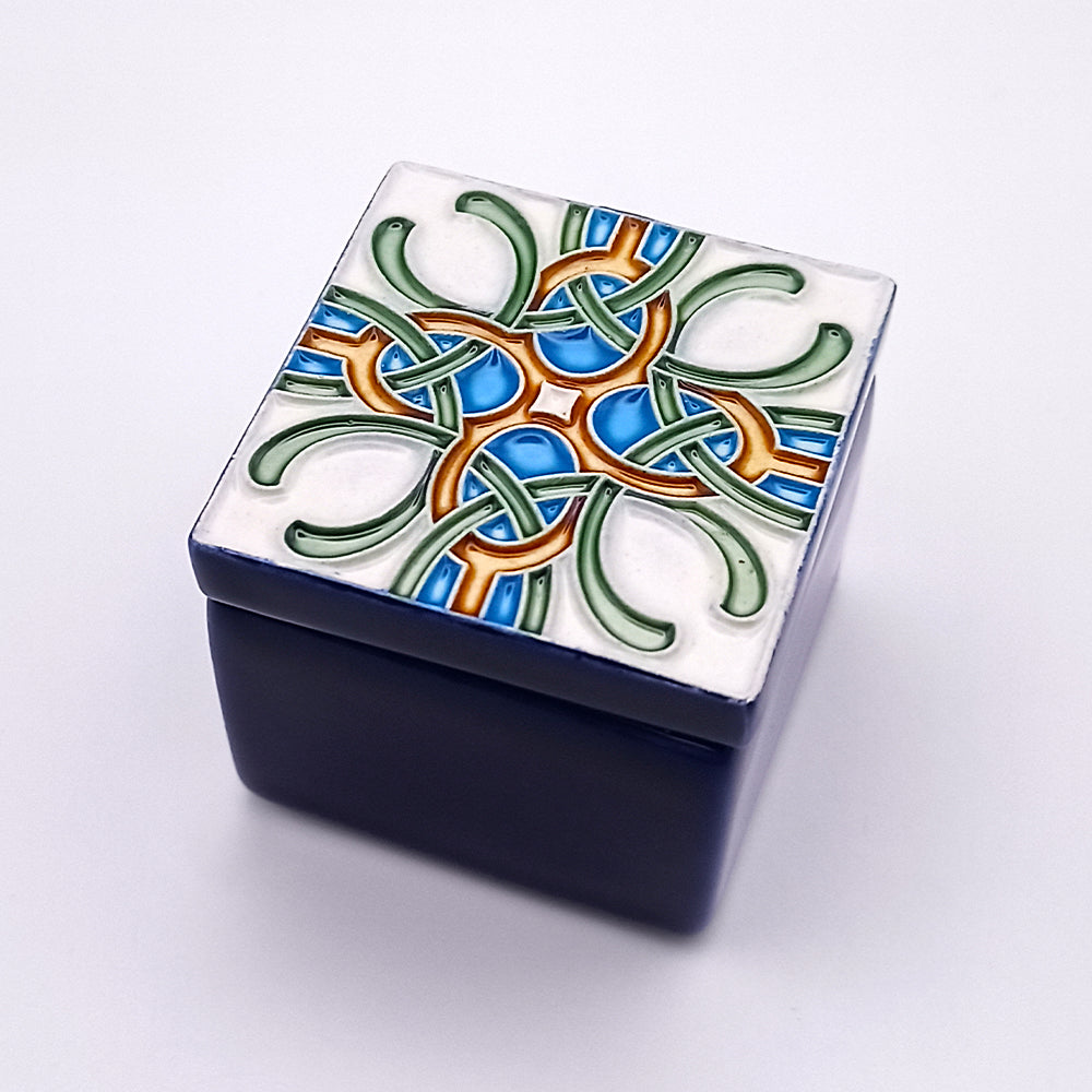 A beautifully crafted Santarém Ceramic Box featuring intricate designs and vibrant colors, perfect for home decor.