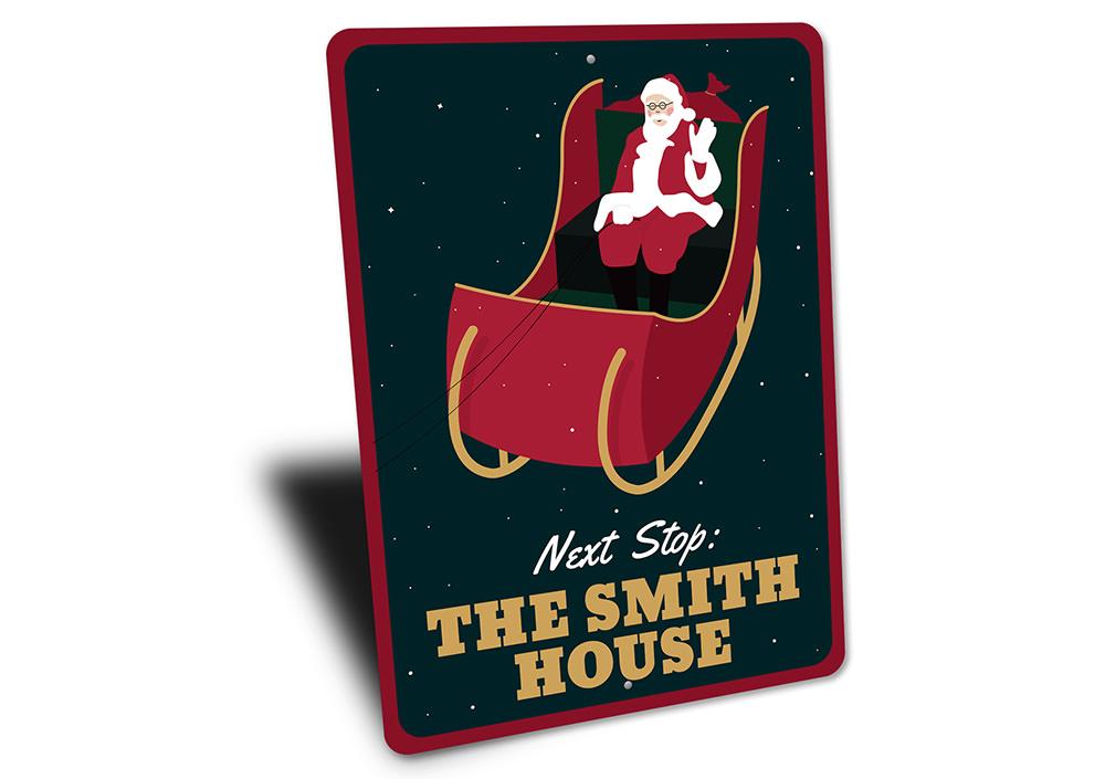 A festive Santa's Sleigh Sign made of high-quality aluminum, featuring a charming design perfect for Christmas decorations.