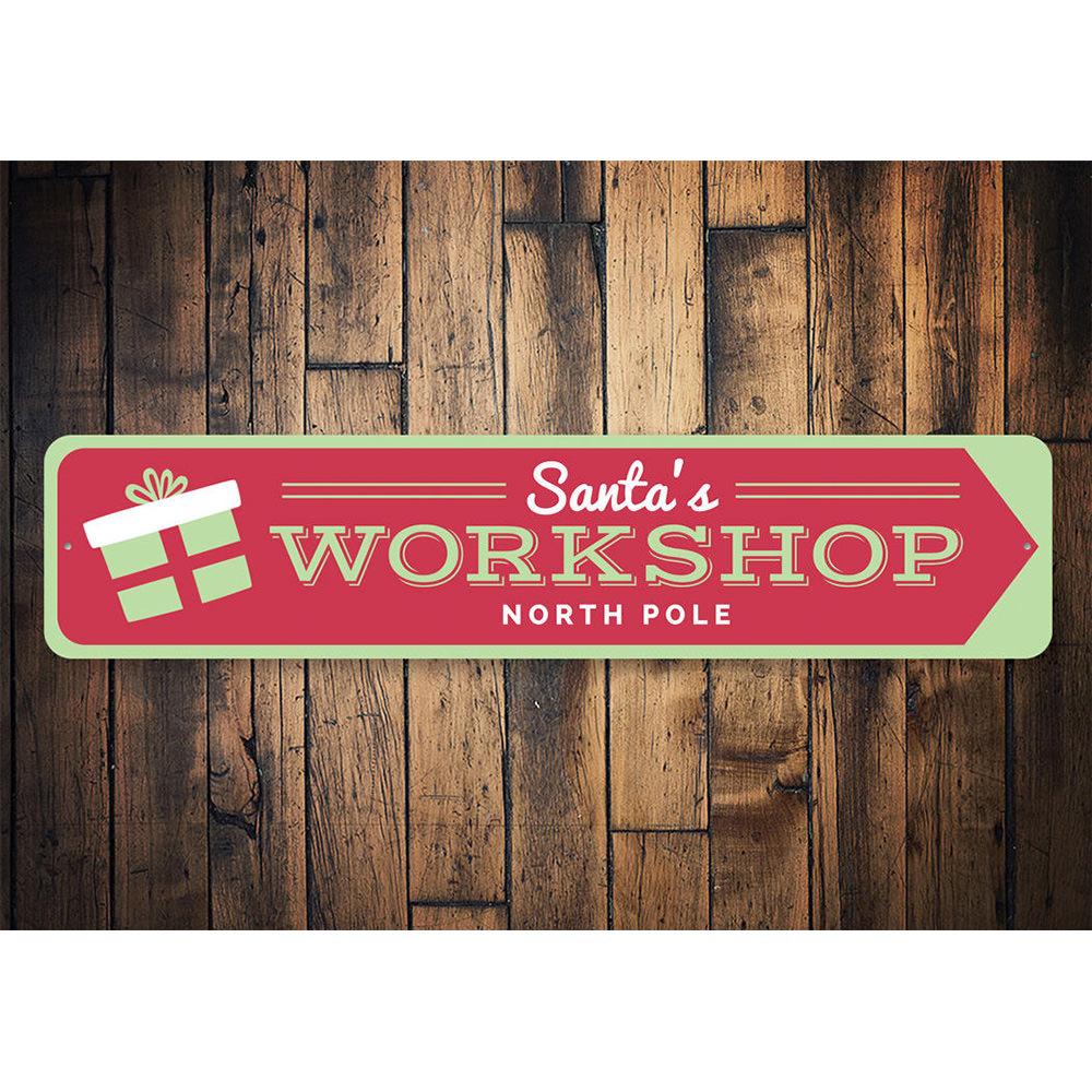 Santa's Workshop North Pole Sign made of durable aluminum, featuring festive colors and a charming design perfect for holiday decorations.