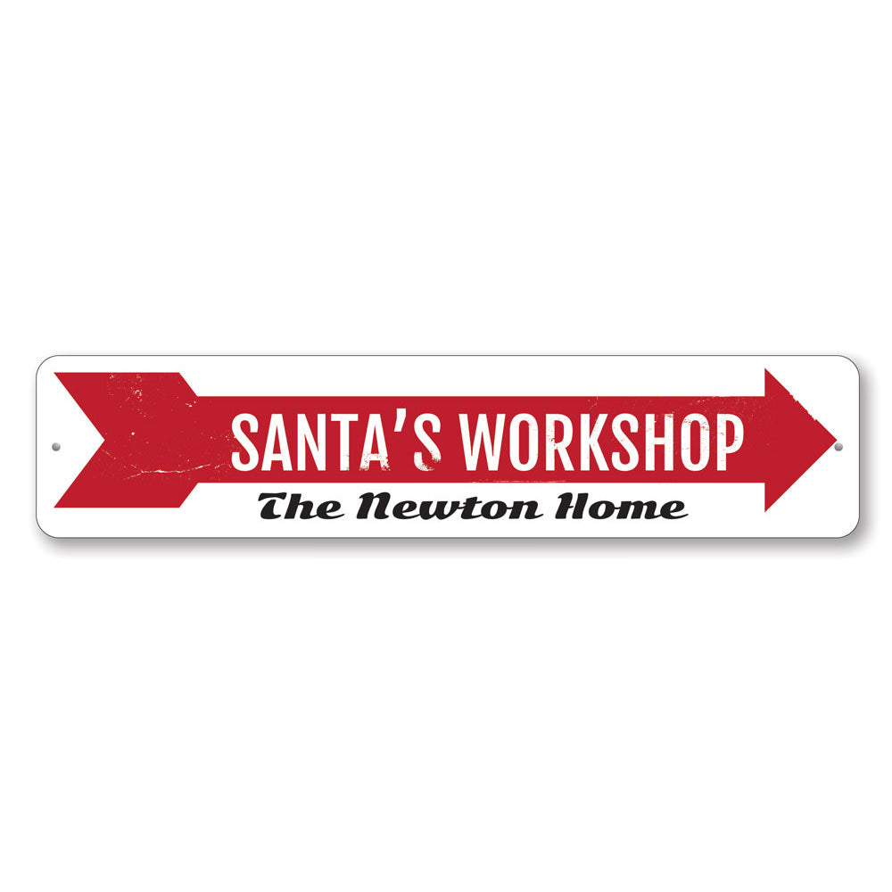 A festive Santa's Workshop Sign made of high-quality aluminum, featuring a charming design perfect for holiday decorations.