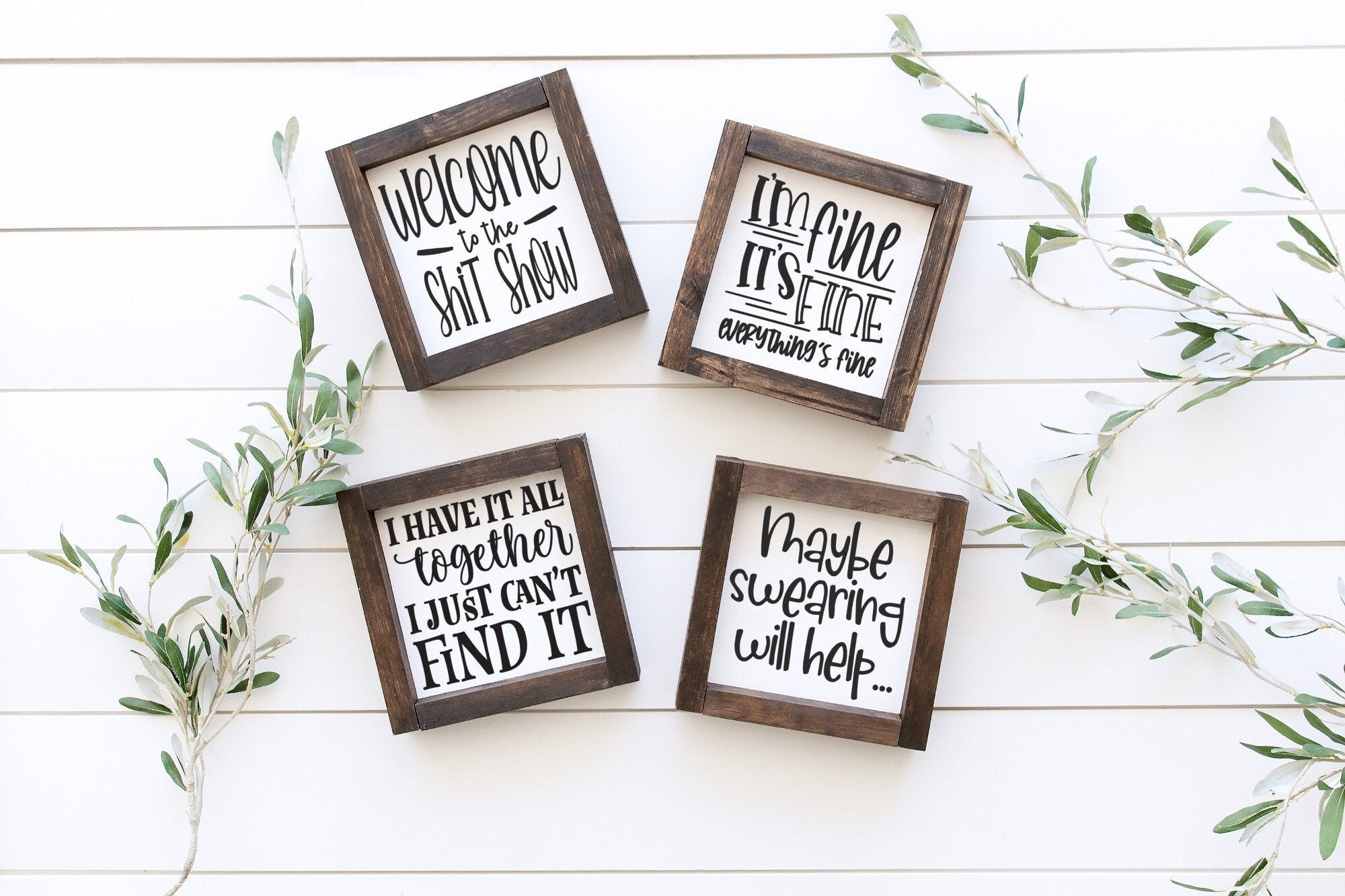 A stylish Sassy Wood Sign featuring a matte white background with unique lettering, showcasing its handmade quality and rustic charm.