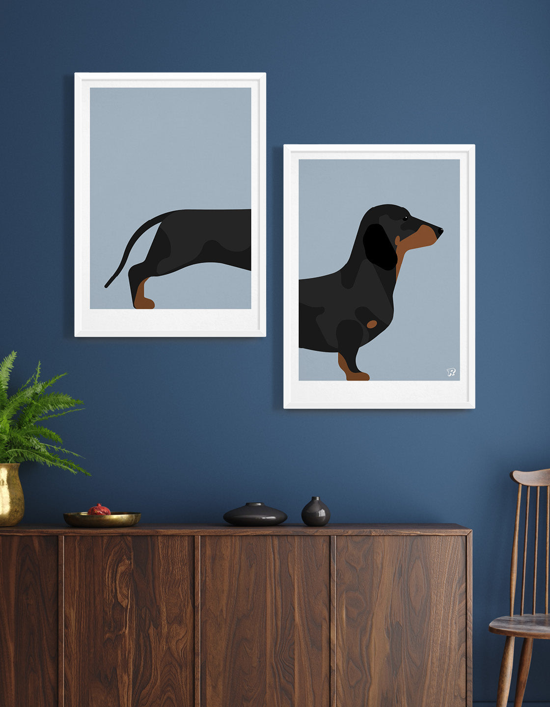 A whimsical pair of Sausage Dogs, showcasing two halves that can be displayed together or hung apart for a humorous effect.