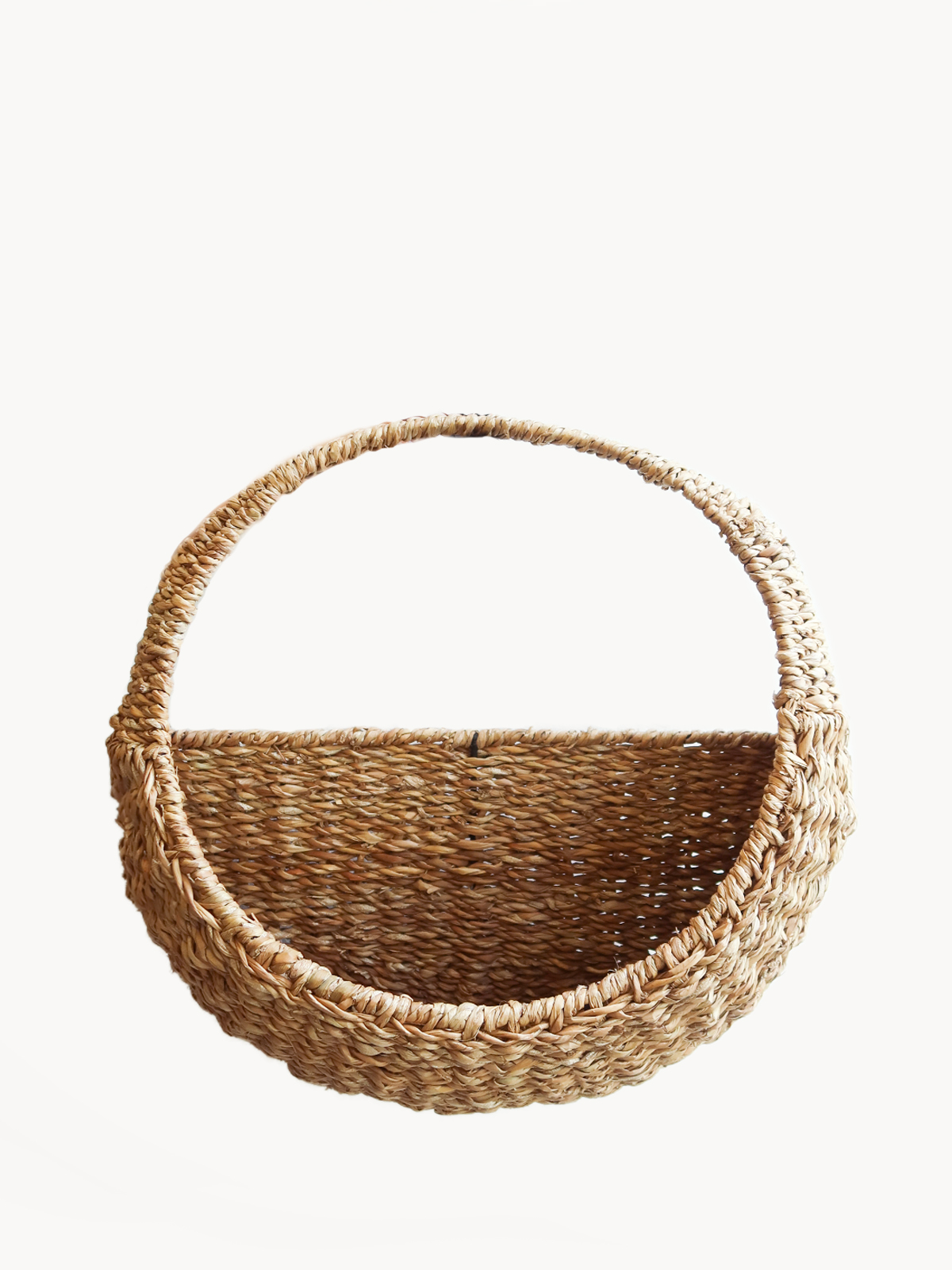 Savar Hanging Planter made of natural seagrass, showcasing its handwoven design and unique texture.